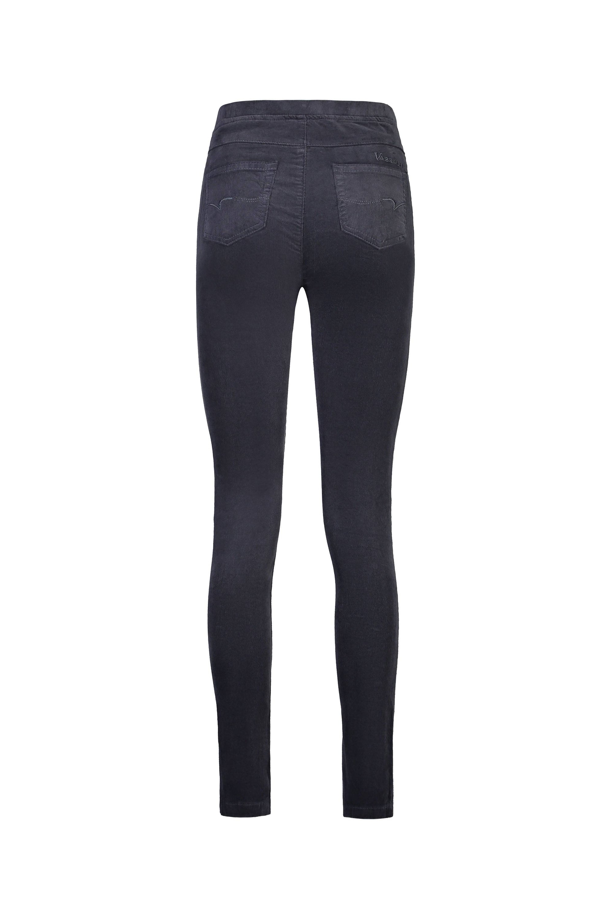 The Vassalli Origin Cord Pull On in Graphite is shown from the back, featuring two back pockets and a fitted leg design crafted from stretch fabric, displayed on a plain white background.
