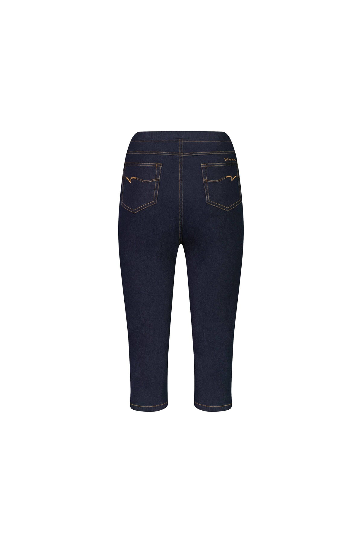 The Vassalli Atlas 3/4 Pant in Indigo Denim (Contrast Stitch) is a fitted, mid-rise pull-on style with two back pockets and gold stitching, shown from the back.