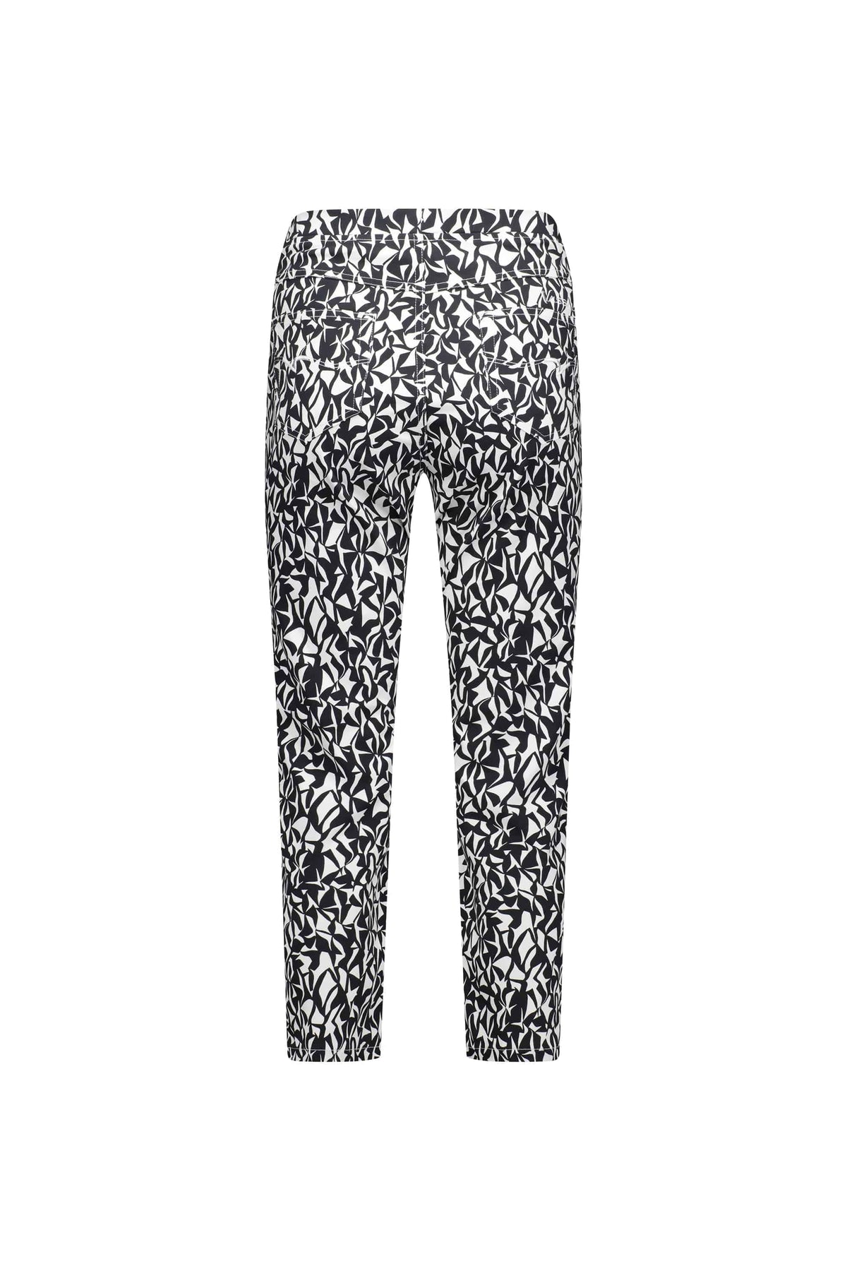 The Vassalli Sierra 7/8 Pant - Accent is a black and white slim leg pull-on style, shown from the back on a white background. Made from stretch fabric, these lightweight pants feature an abstract leaf or geometric print.