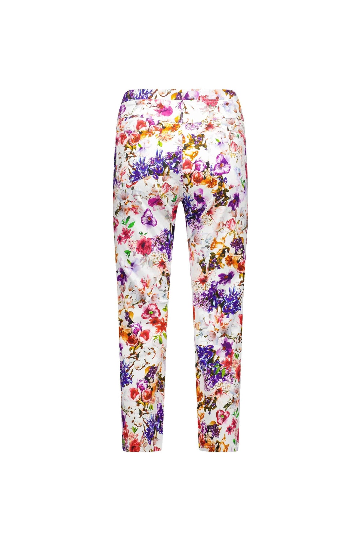 Back view of Vassalli Sierra 7/8 Pant - Burst showcasing a vibrant multicolored floral print on white. These lightweight pull-on pants offer a high waist, ankle-length hems, and comfortable stretch fabric.