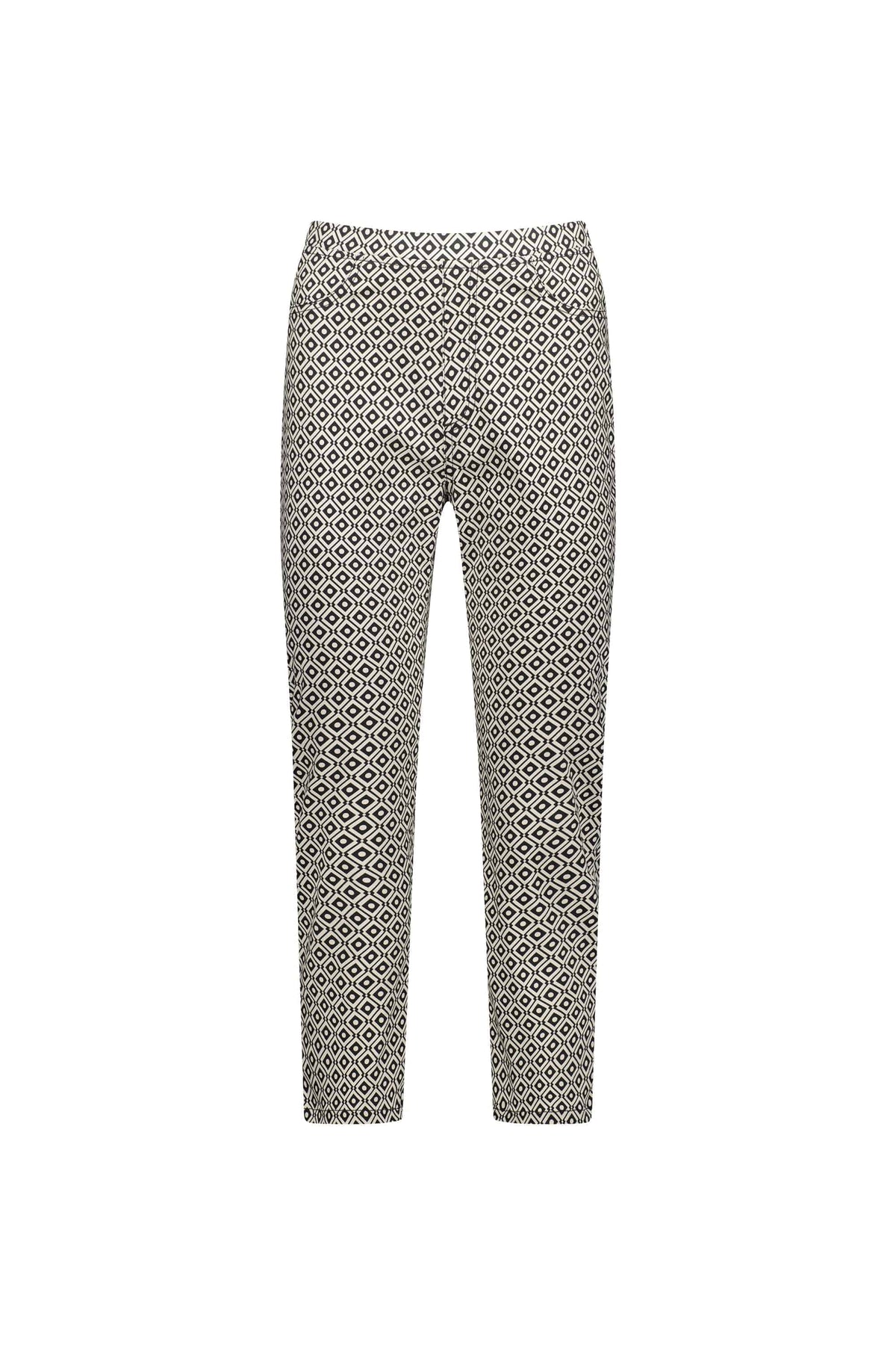 The Vassalli Sierra 7/8 Pant - Sahara features a lightweight, pull-on slim leg design with an all-over black and white diamond geometric pattern, shown on a white background.