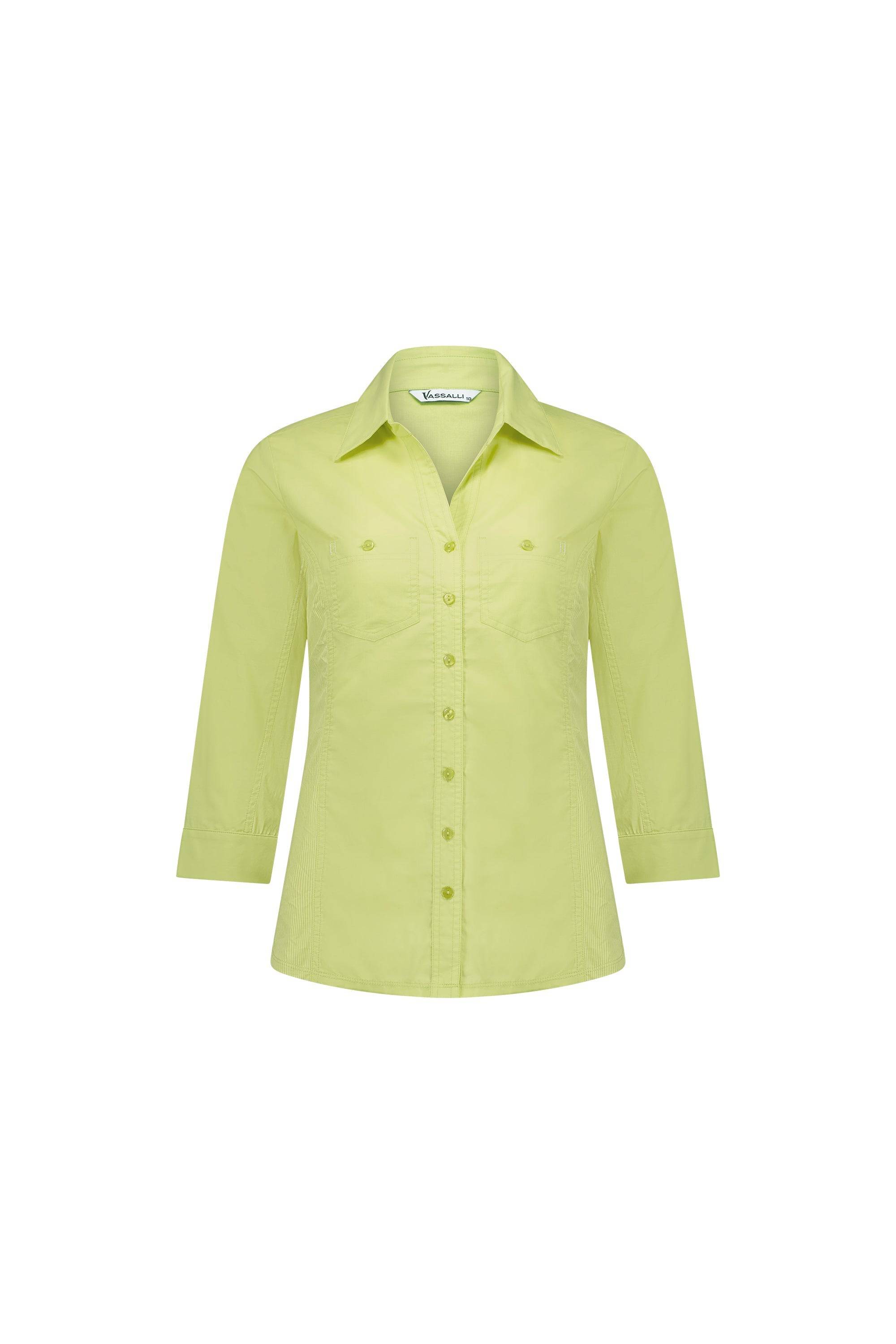 The Vassalli Isla Shirt - Apple is a light green, slim-fit women's button-up with three-quarter sleeves, a collar, and two chest pockets, shown on a white background.