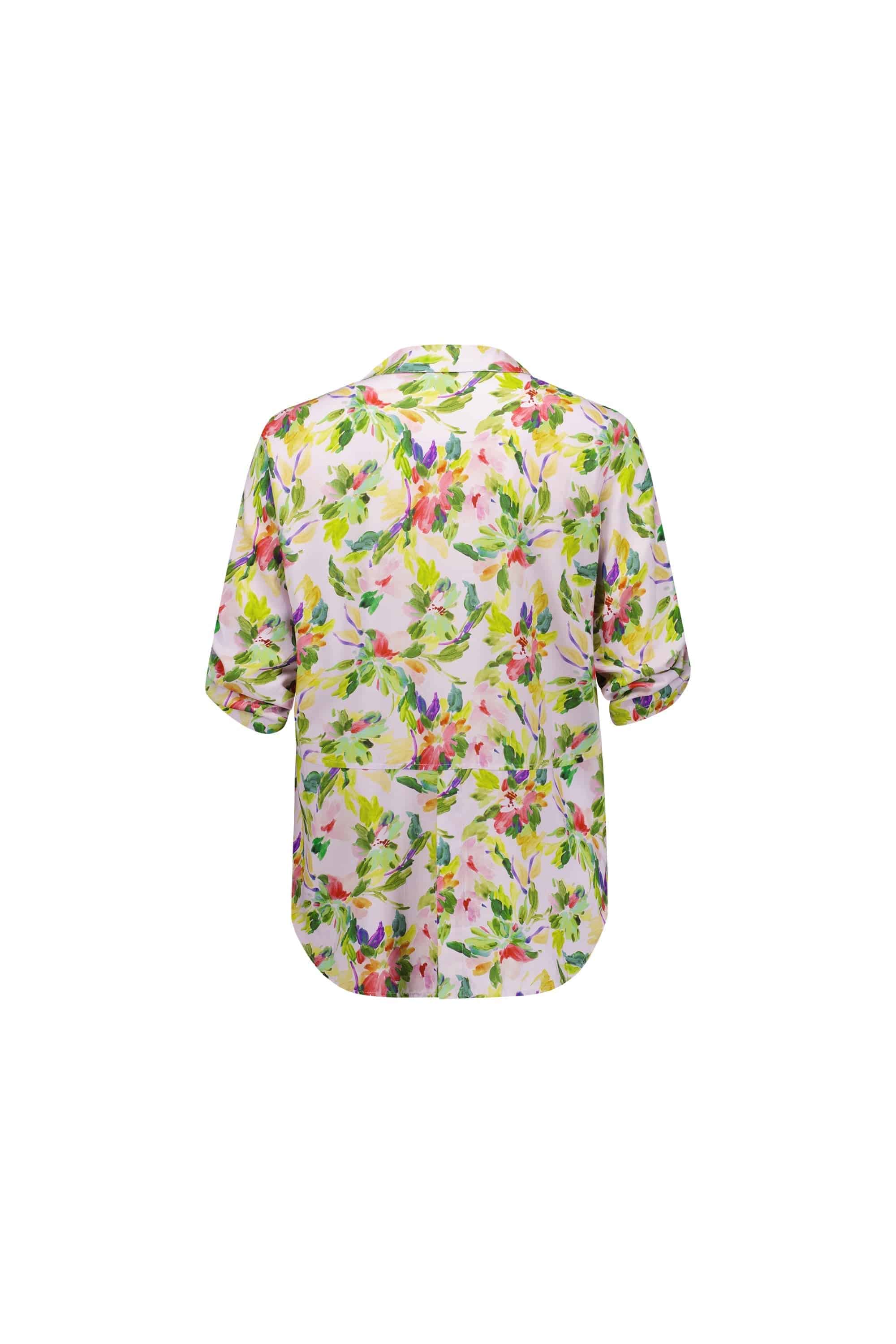 Back view of the Vassalli Placket Shirt - Capri, featuring a colorful floral print in green, pink, purple, and yellow on white. This short-sleeved shirt is shown against a plain white background.