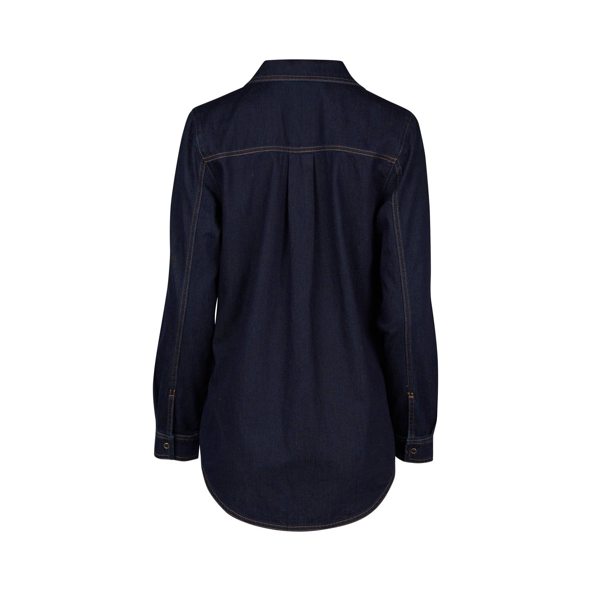 The Vassalli Shirt With Poppers in dark denim is displayed from the back, highlighting its slim fit, curved hem, back yoke, and contrast stitching on the seams and cuffs, all set against a white background.
