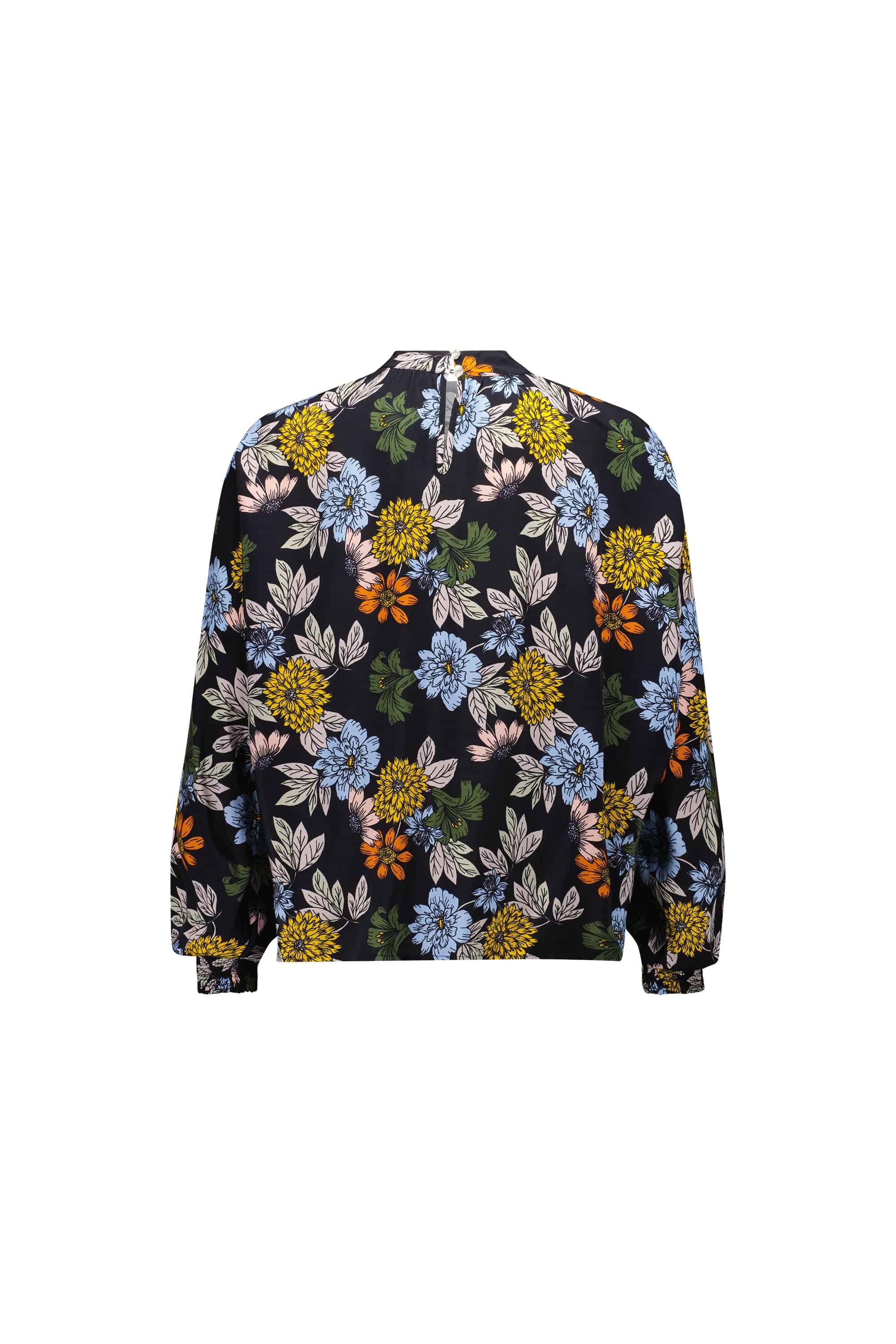 The Vassalli Printed Top - Viva La Bloom is a floaty long sleeve blouse with a black background and vibrant blue, yellow, orange, and white floral print with green leaves. It features a round neckline and relaxed fit.