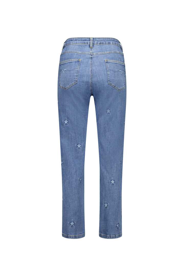 The Vassalli Onya Jean in Light Wash features a straight-leg cut, classic waistband with belt loops, two rear pockets, and small star-shaped embroidery scattered along the legs.