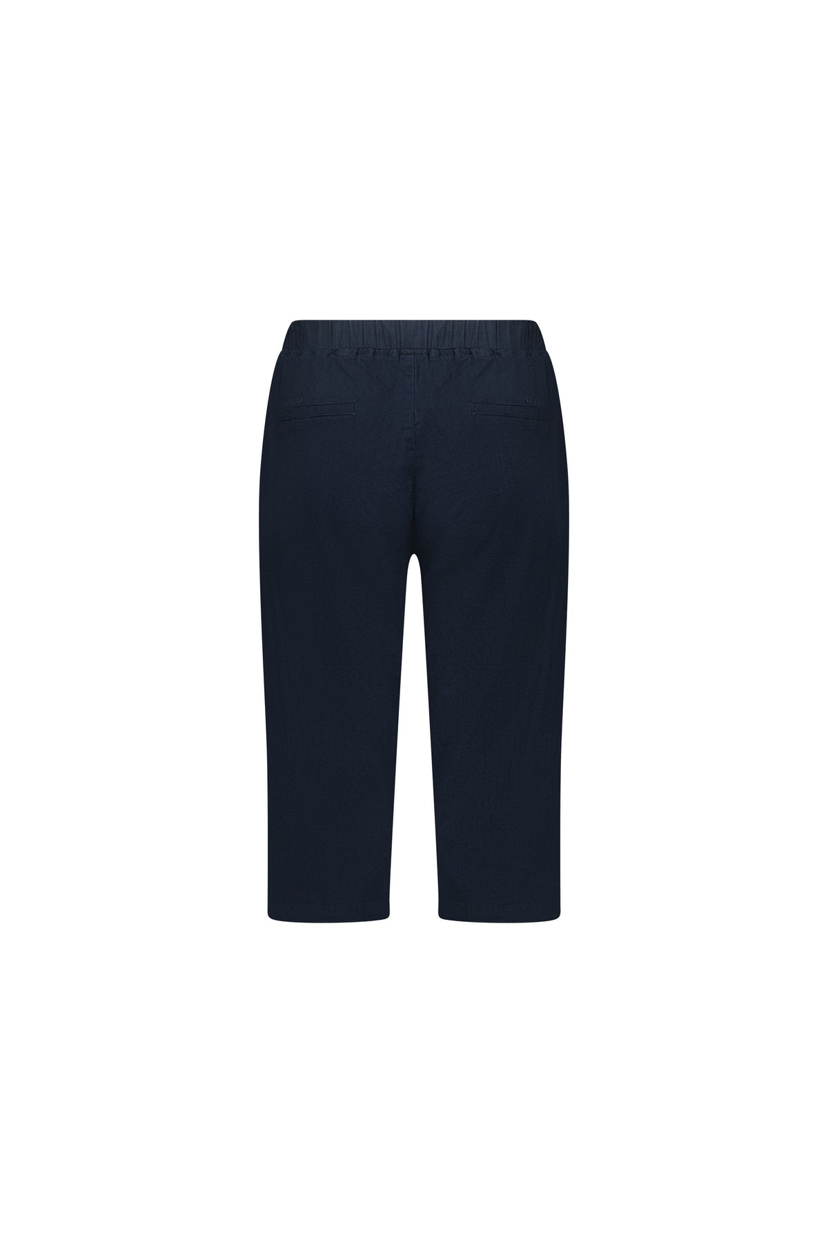 The Vassalli Drew 3/4 Pant in Ink is a navy blue, knee-length stretch cotton short with an elastic waistband and two back pockets, shown from the back on a white background.