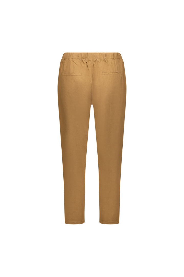Back view of Vassalli's Getaway Pant in Caramel, featuring an elastic waist and two back welt pockets in a straight-leg fit, shown against a white background.
