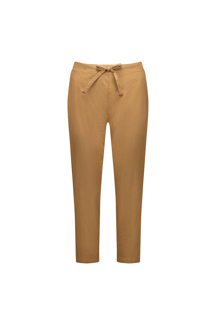 Vassalli's Getaway Pant in Caramel is an ankle-length, relaxed-fit style with a drawstring and elastic waist for comfort. Shown against a white background, these pants are crafted from lightweight fabric.