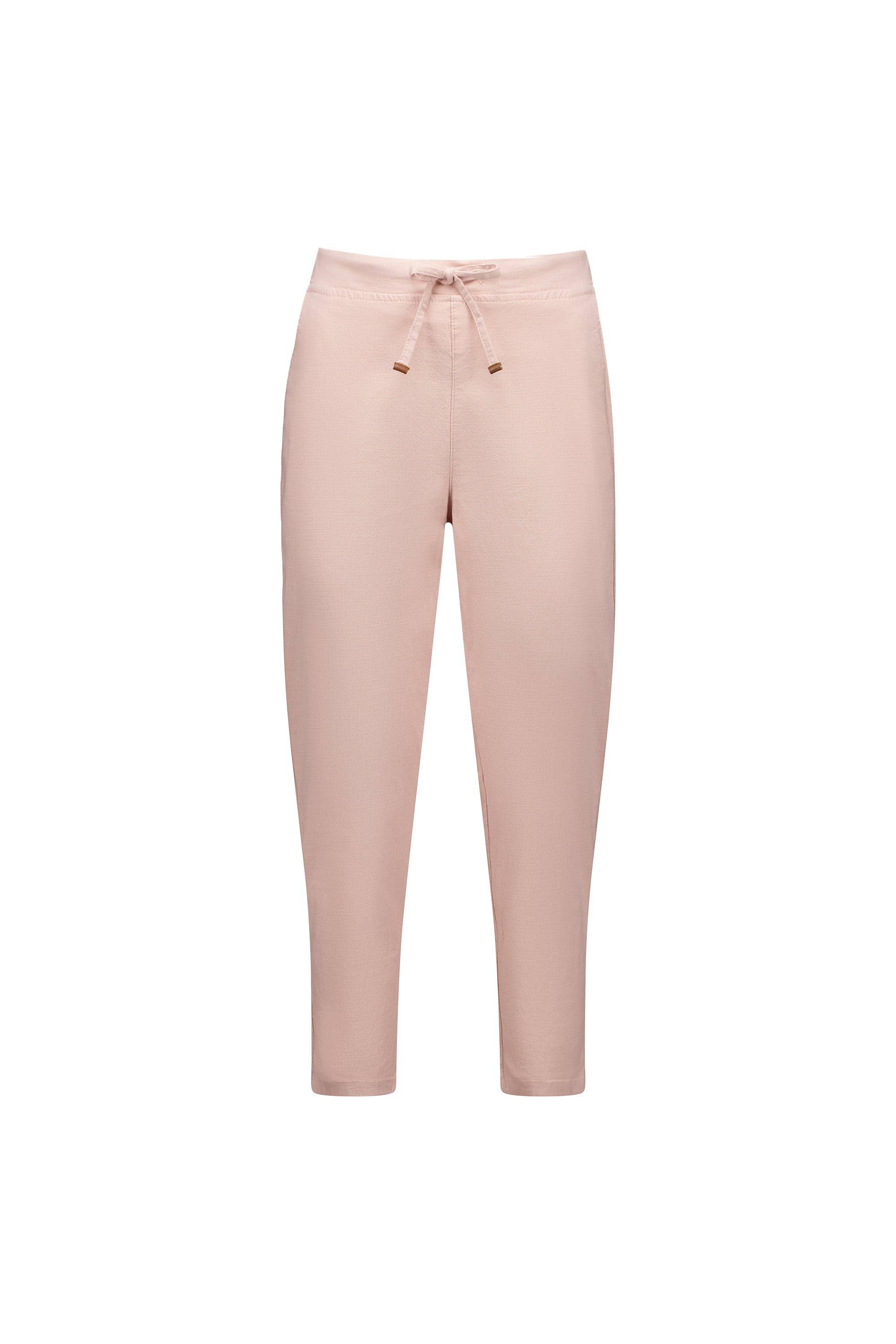 The Vassalli Denver 7/8 Pant in Soft Pink features an elastic waistband, drawstring tie, slightly tapered skinny legs, and ankle-length hems, shown on a plain white background.