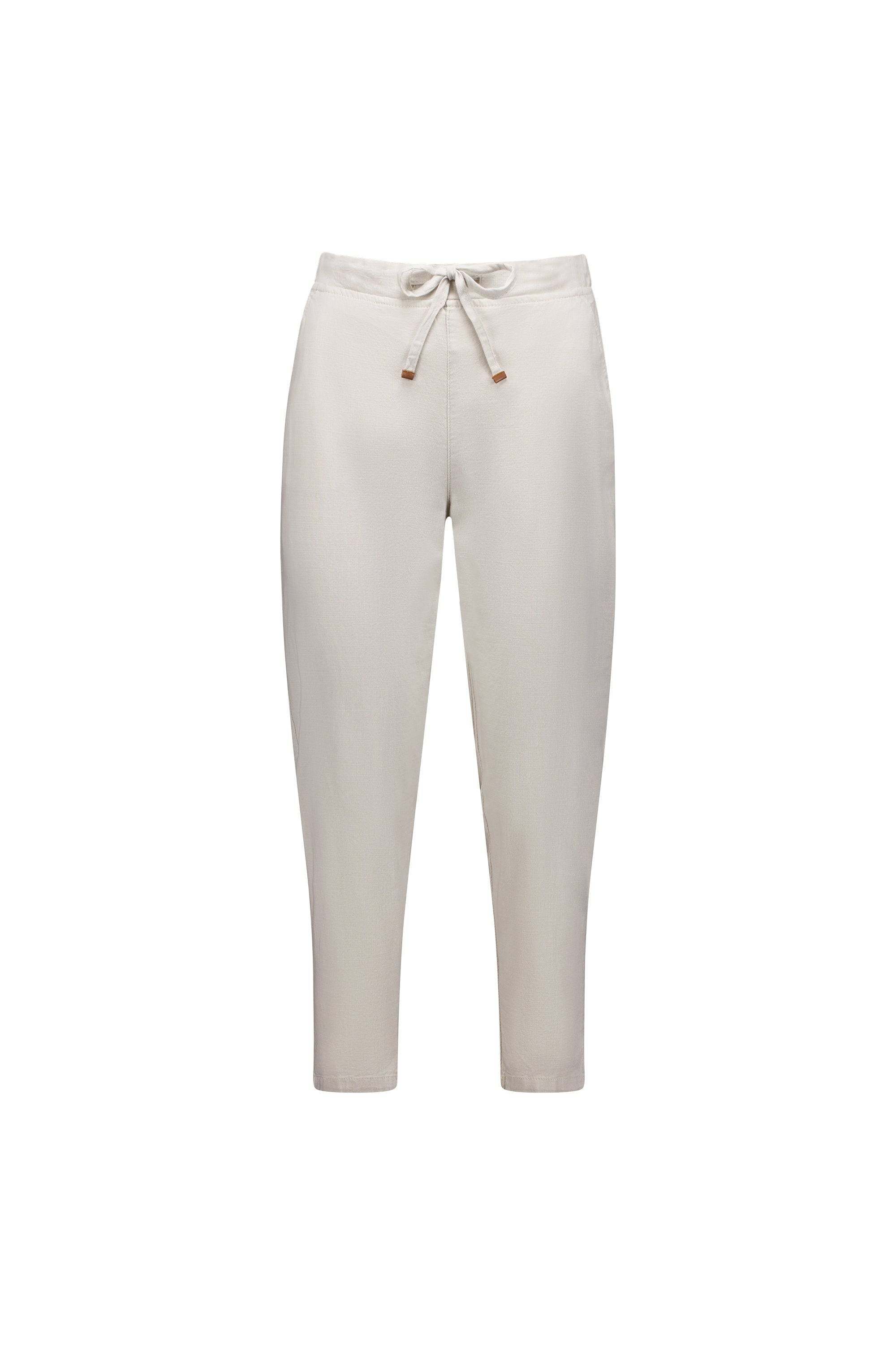 The Vassalli Denver 7/8 Pant in Stone features a light beige color, elastic waistband, side pockets, and a comfortable cotton blend fabric, displayed on a white background.