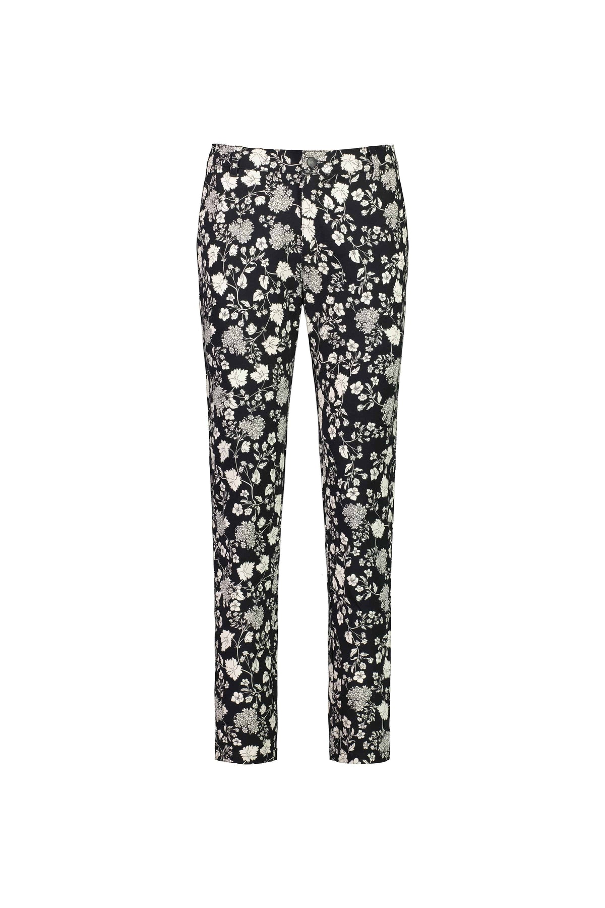 Vassalli Ankle Grazer Pant - Gypsy features an all-over white floral print on black stretch fabric for comfort and style. The skinny leg pants are shown on a plain white background.