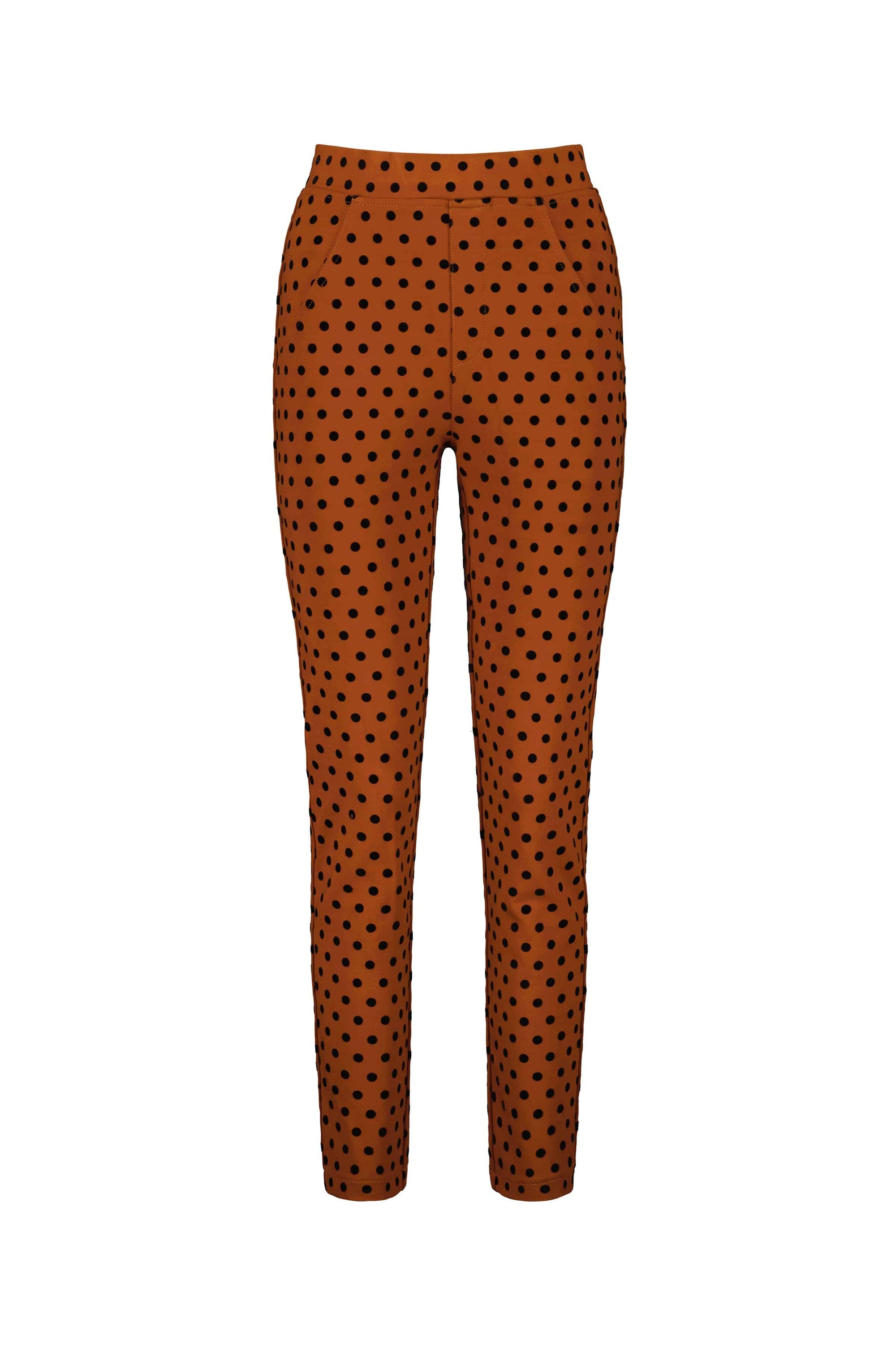The Vassalli View Pant - Rustic is a high-waist, ankle-grazer skinny leg pant with side pockets and a tailored slim fit, featuring an all-over black polka dot print.
