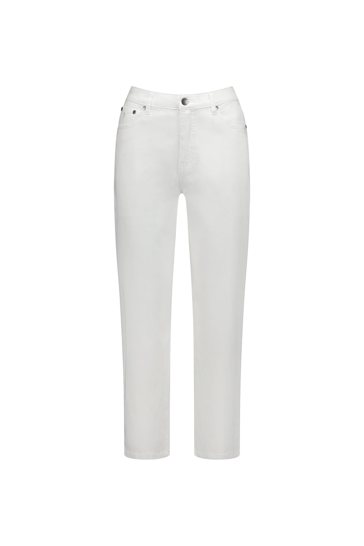 The Vassalli Slim Leg 7/8 Pant in white features a high waist, button and zip closure, front and back pockets, and is displayed on a plain white background.