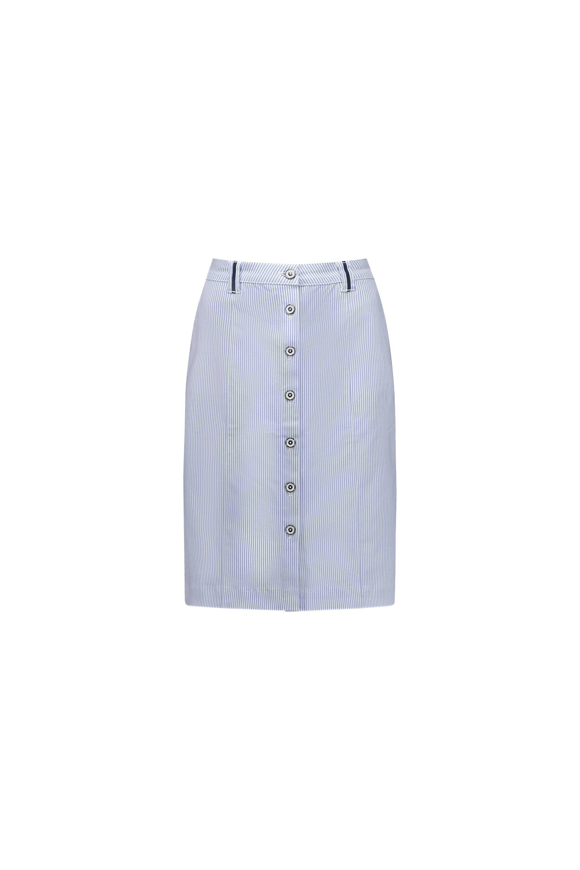 The Vassalli Orion Skirt - Blue Stripe features light blue and white vertical stripes, front button closure, belt loops, and a flattering knee-length fit, shown on a plain white background.