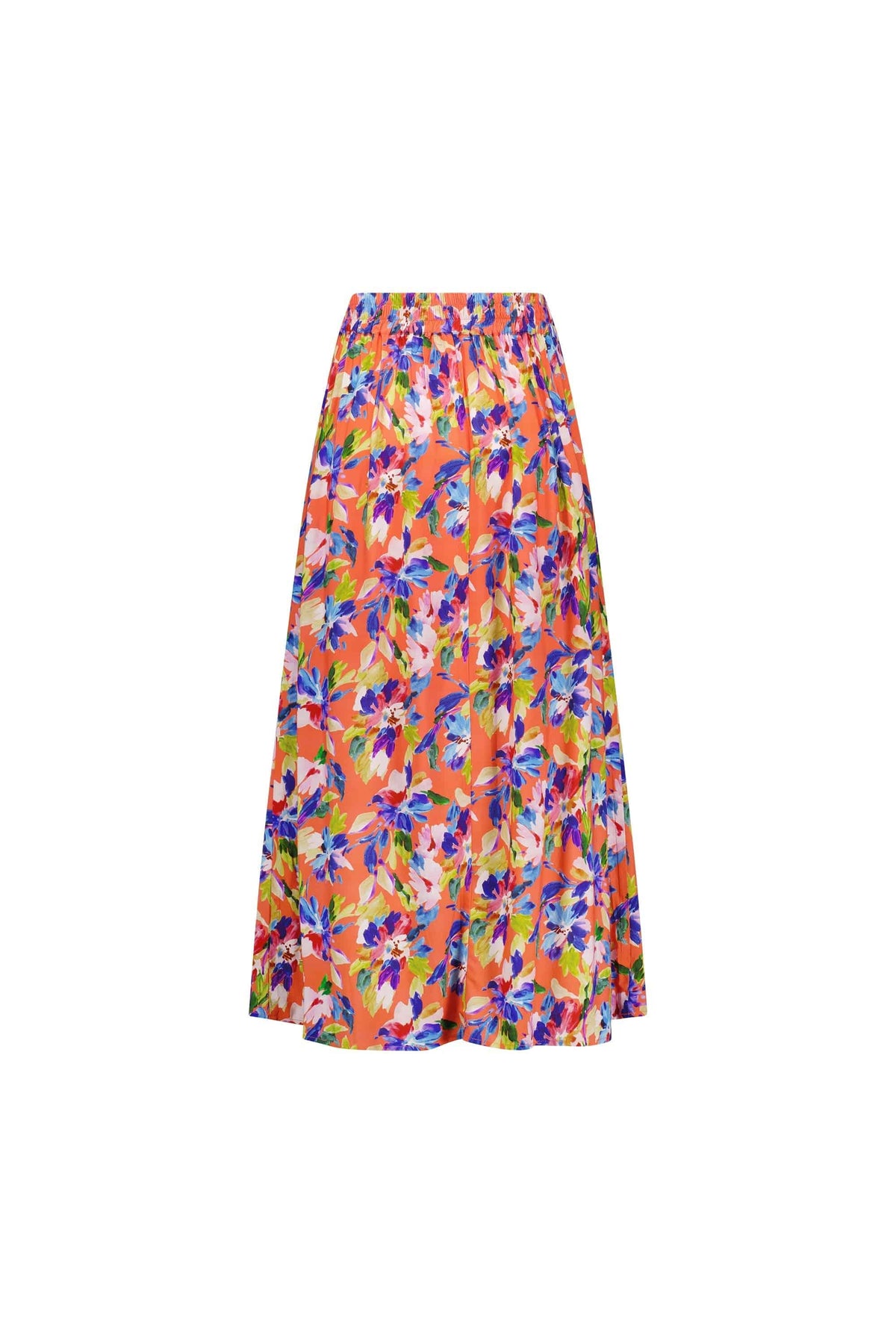 The Vassalli Long Skirt - Rio features a vibrant multicolored floral print on orange, a pull-on style with elastic back waistband, and a flowing, midi-length silhouette for effortless comfort and style.