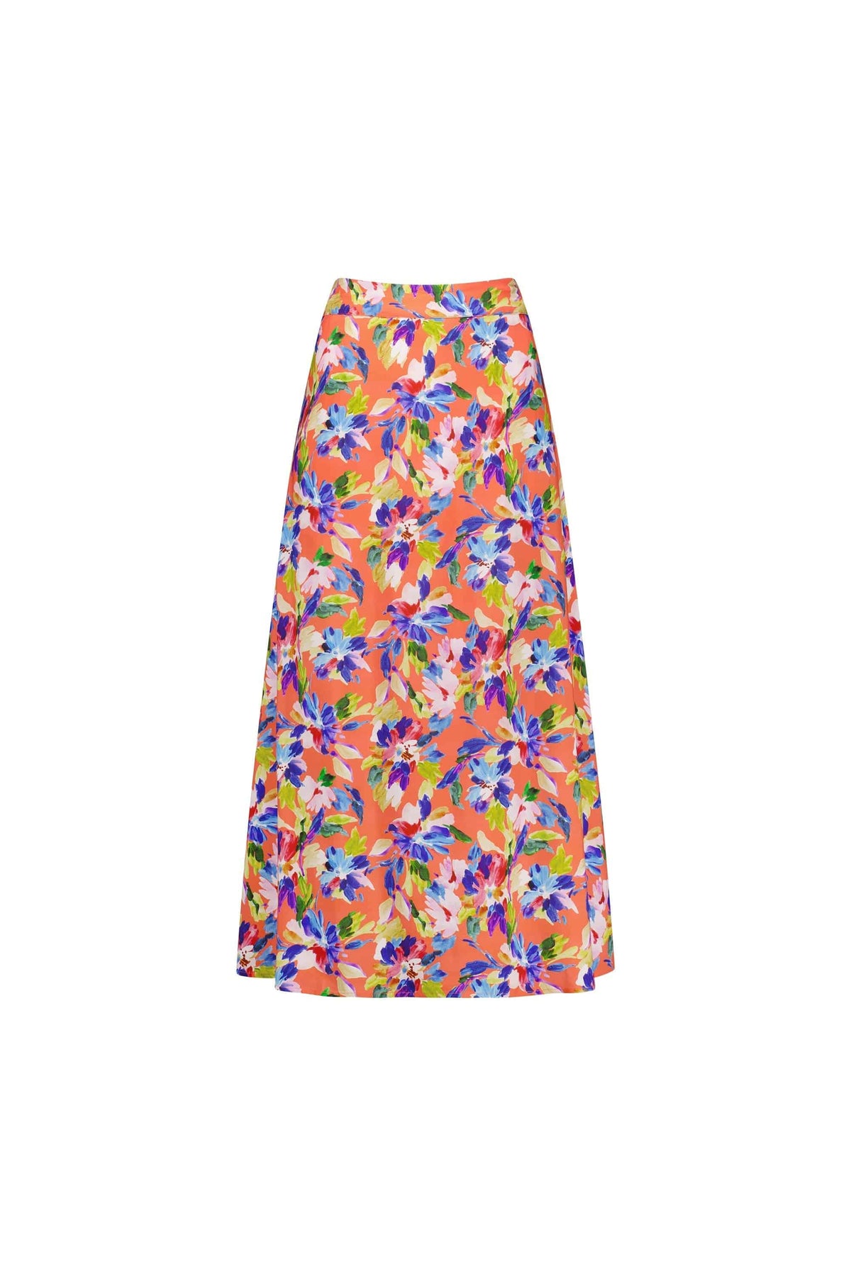 The Vassalli Long Skirt - Rio features a vibrant floral print in blue, pink, yellow, and green on bright orange, with an elastic back waistband for comfort. This knee-length A-line skirt is shown against a plain white backdrop.