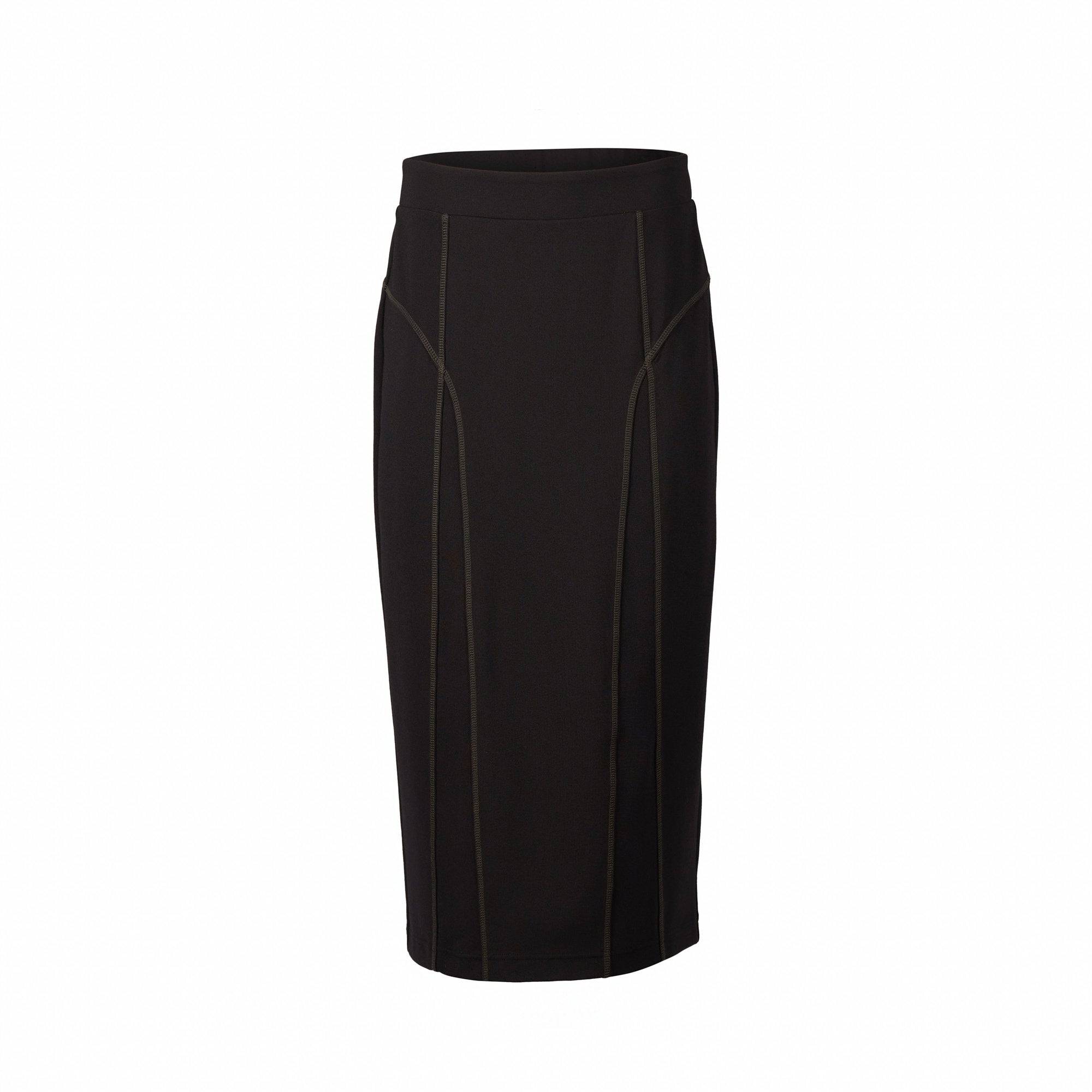 The Vassalli Skirt - Black/Khaki features a high waist, vertical seam detailing, an elastic waistband, and stretch fabric. This knee-length skirt is shown against a white background.
