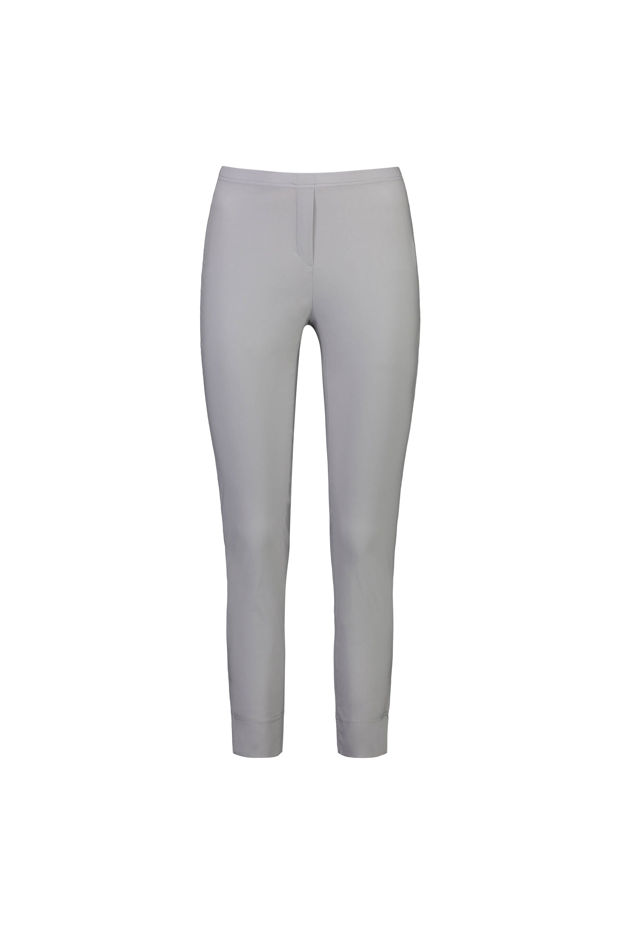 The Vassalli Paris Capri Pant - Silver is a light gray, slim-fit, ankle-length women's pant with a mid-rise 7/8 fit and stretch fabric. It features a clean design without visible pockets or embellishments, shown front-facing on a white background.