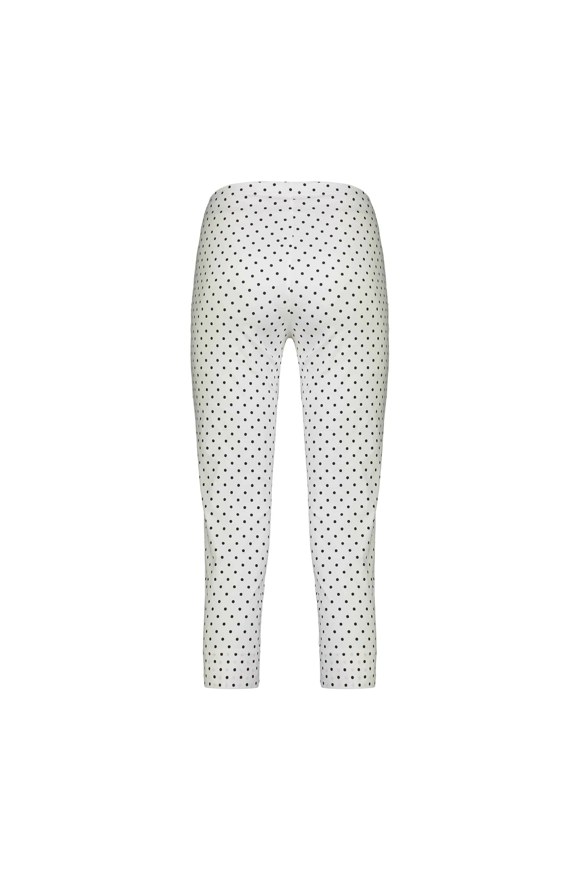 The Vassalli Paris Printed Crop Pant - Spot features white, high-waisted leggings with a black polka dot pattern in stretch fabric, shown front-facing against a plain white background with no visible branding.
