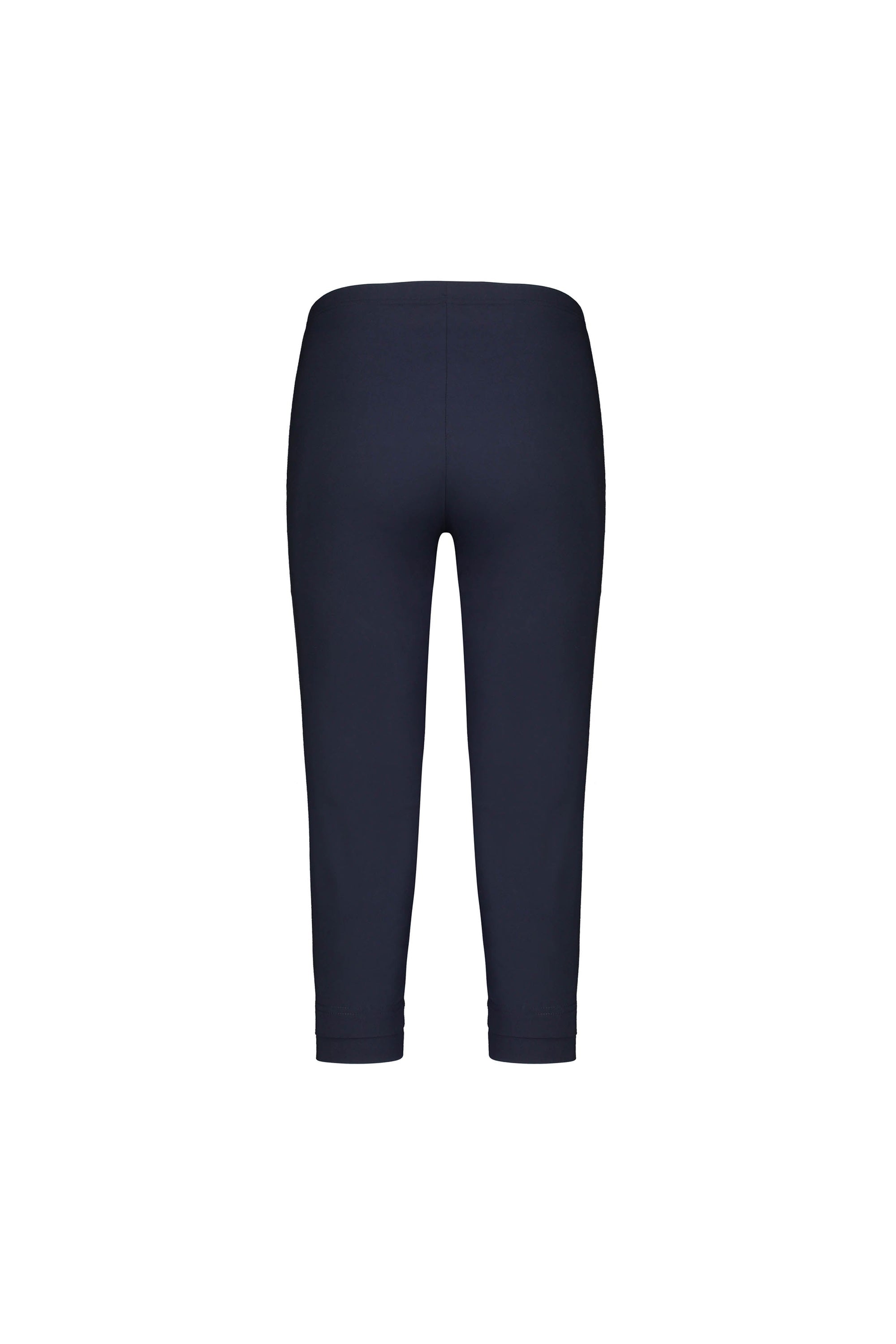 Vassalli Paris 3/4 Pant - Inka shown from the back against a white background. These navy blue, mid-rise cropped leggings feature a simple, fitted stretch design with no visible pockets or embellishments.