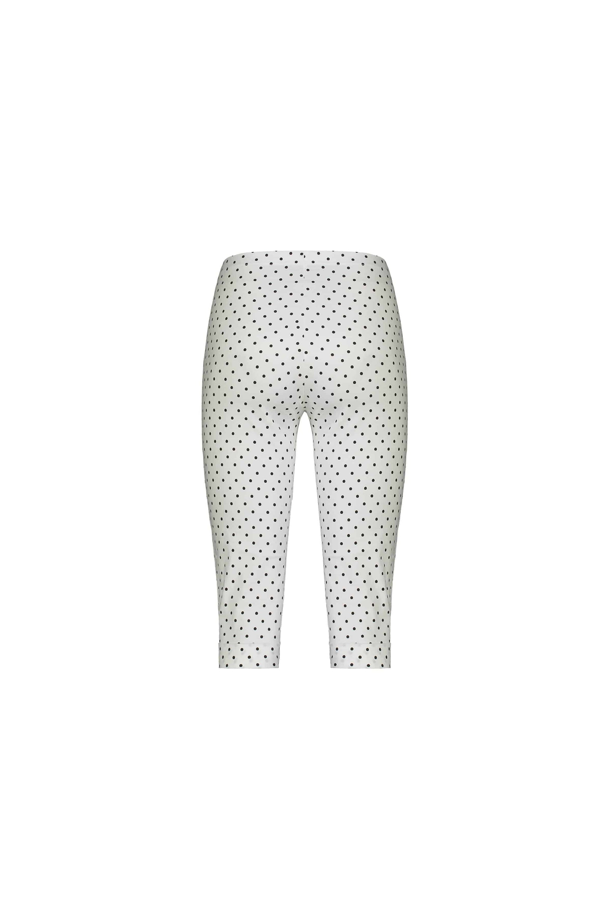 The Vassalli Paris Printed Short - Spot features a black polka dot pattern on white stretch fabric with a mid-rise fit and is displayed against a plain white background.