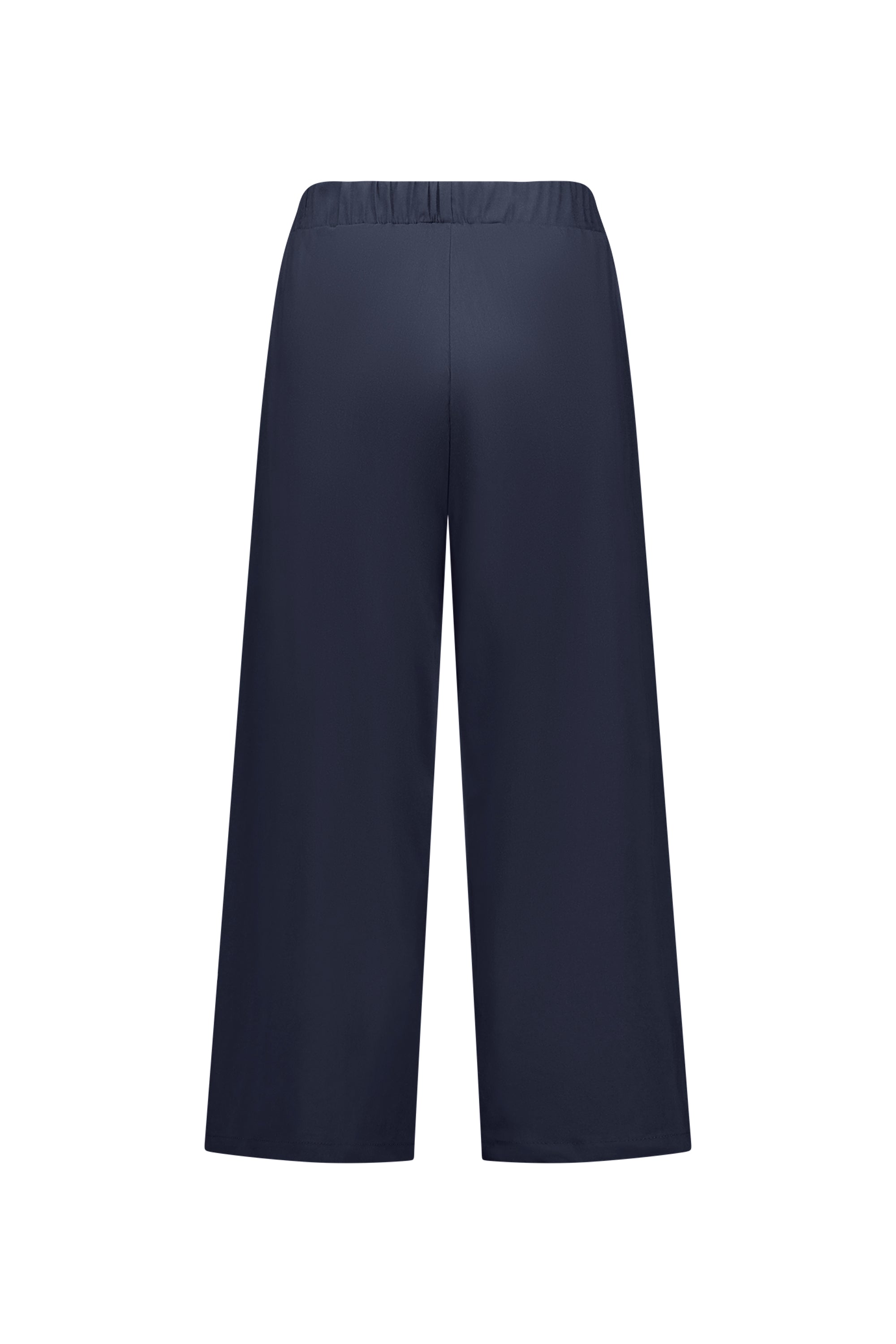 The Vassalli Paris Wide Leg Crop - Inka pants, shown from the back on a white background, feature a navy hue, elastic waistband, ankle-length loose fit, and are crafted from stretch fabric for comfort.