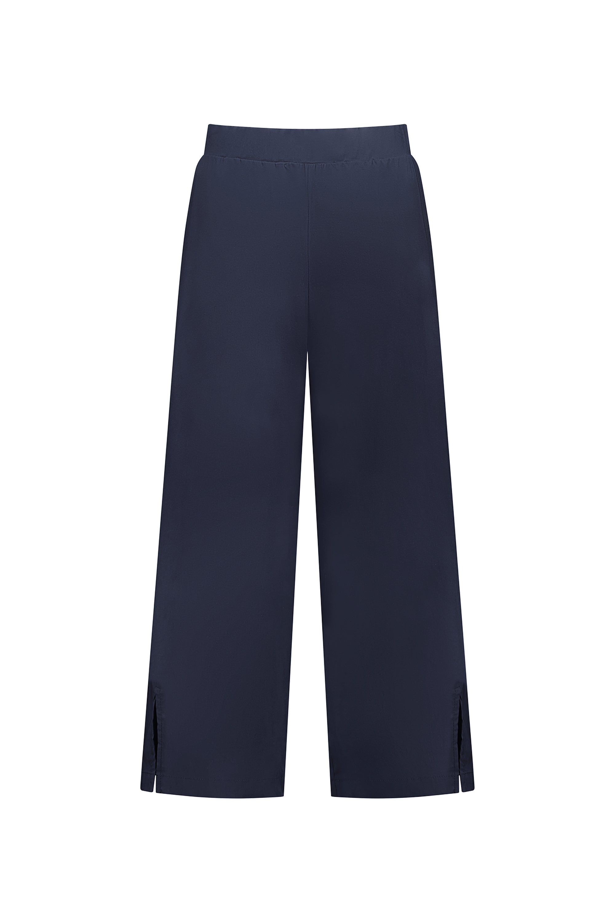 The Vassalli Paris Wide Leg Crop - Inka pants in navy blue are made in New Zealand, featuring stretch fabric, an elastic waistband, and small slits at the leg bottoms. Shown on a plain white background.