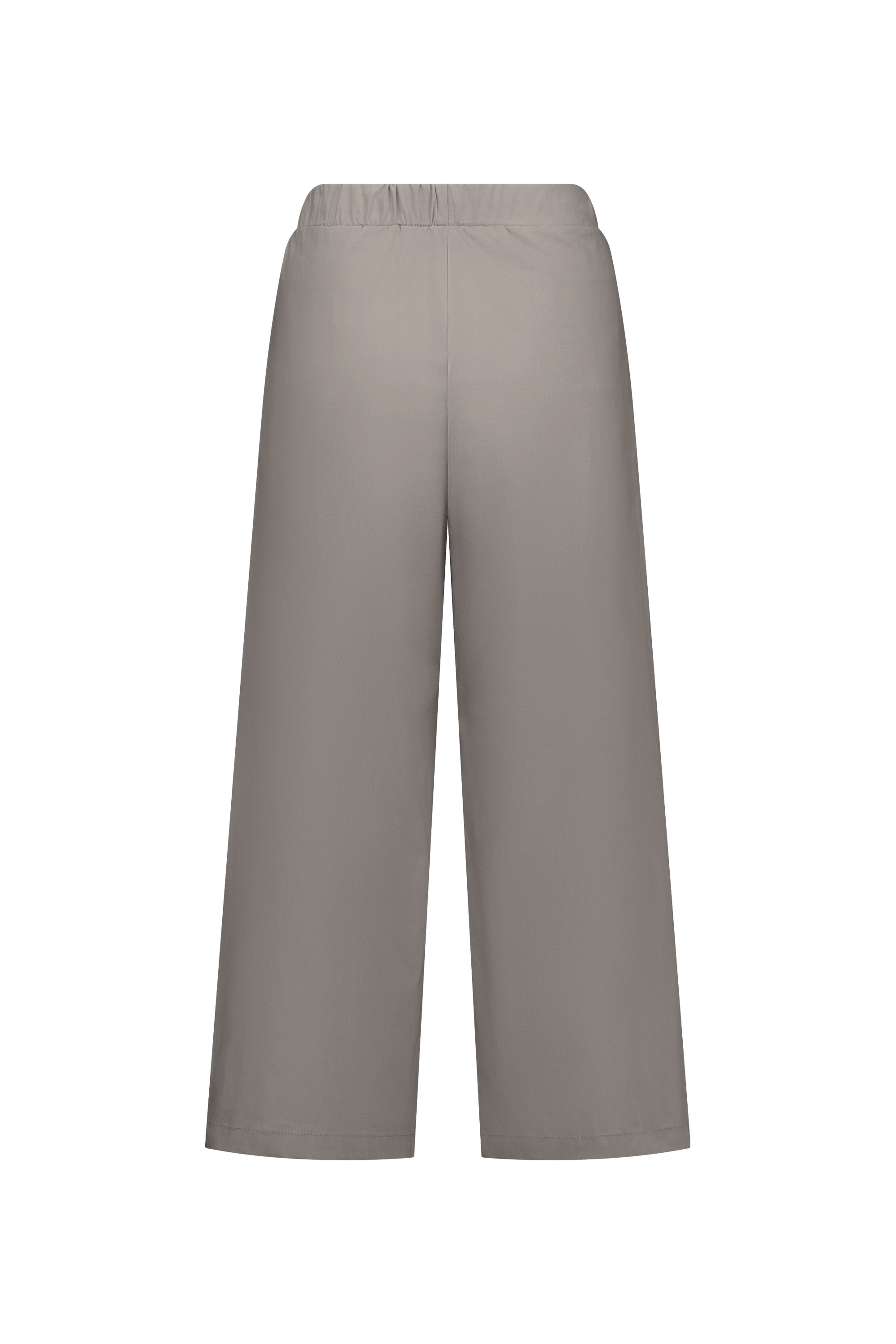 Back view of Vassalli Paris Wide Leg Crop - Latte pants with a loose fit, elastic waistband, and wide legs, made in New Zealand, shown on a plain white background.