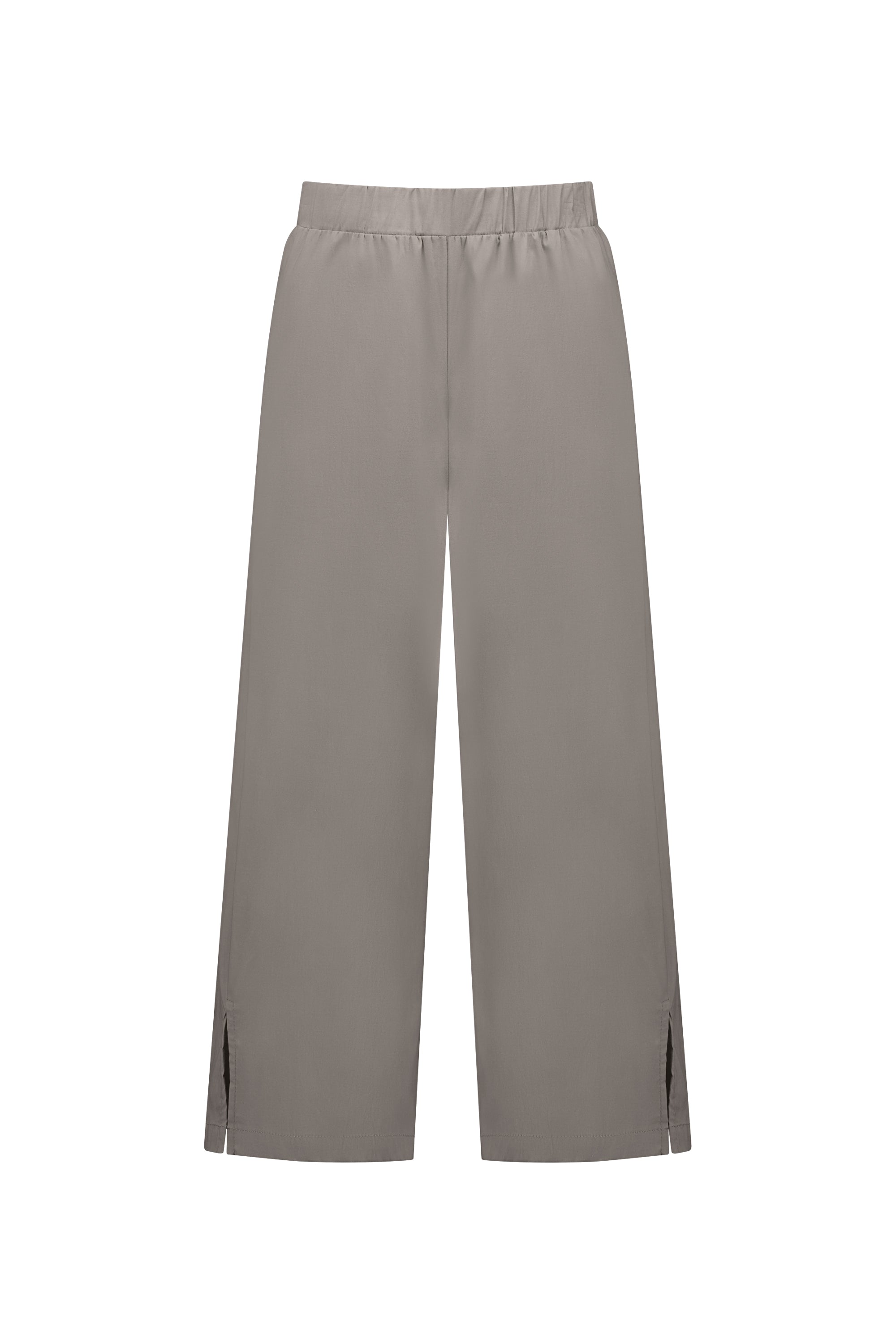 The Vassalli Paris Wide Leg Crop - Latte features a loose fit, wide legs, stretch fabric, elastic waistband, and small slits at the hem, shown on a plain white background.