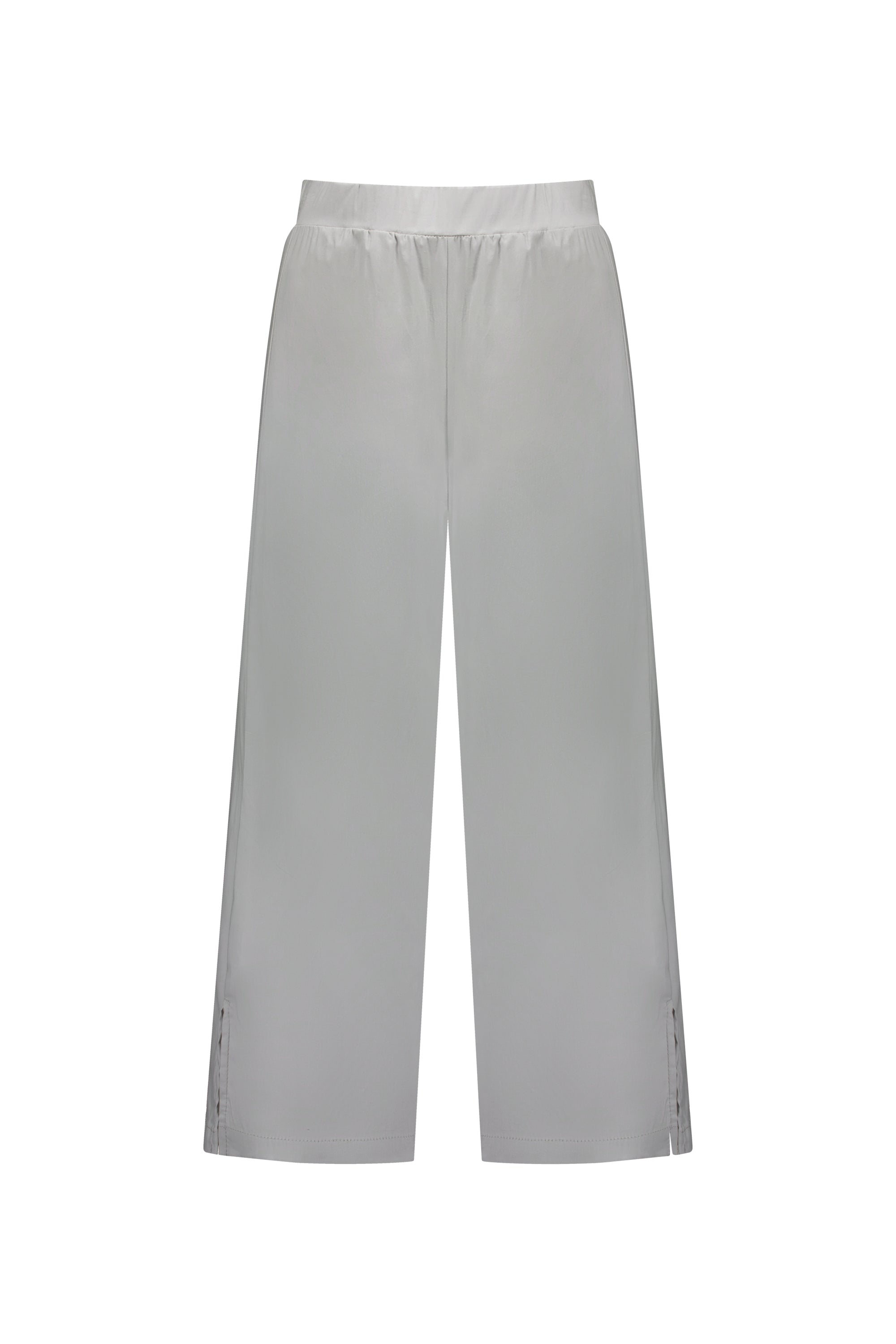 A pair of Vassalli Paris Wide Leg Crop - Silver pants, crafted in New Zealand from stretch fabric with an elastic waistband and small button accents at the hem, displayed against a plain white background.