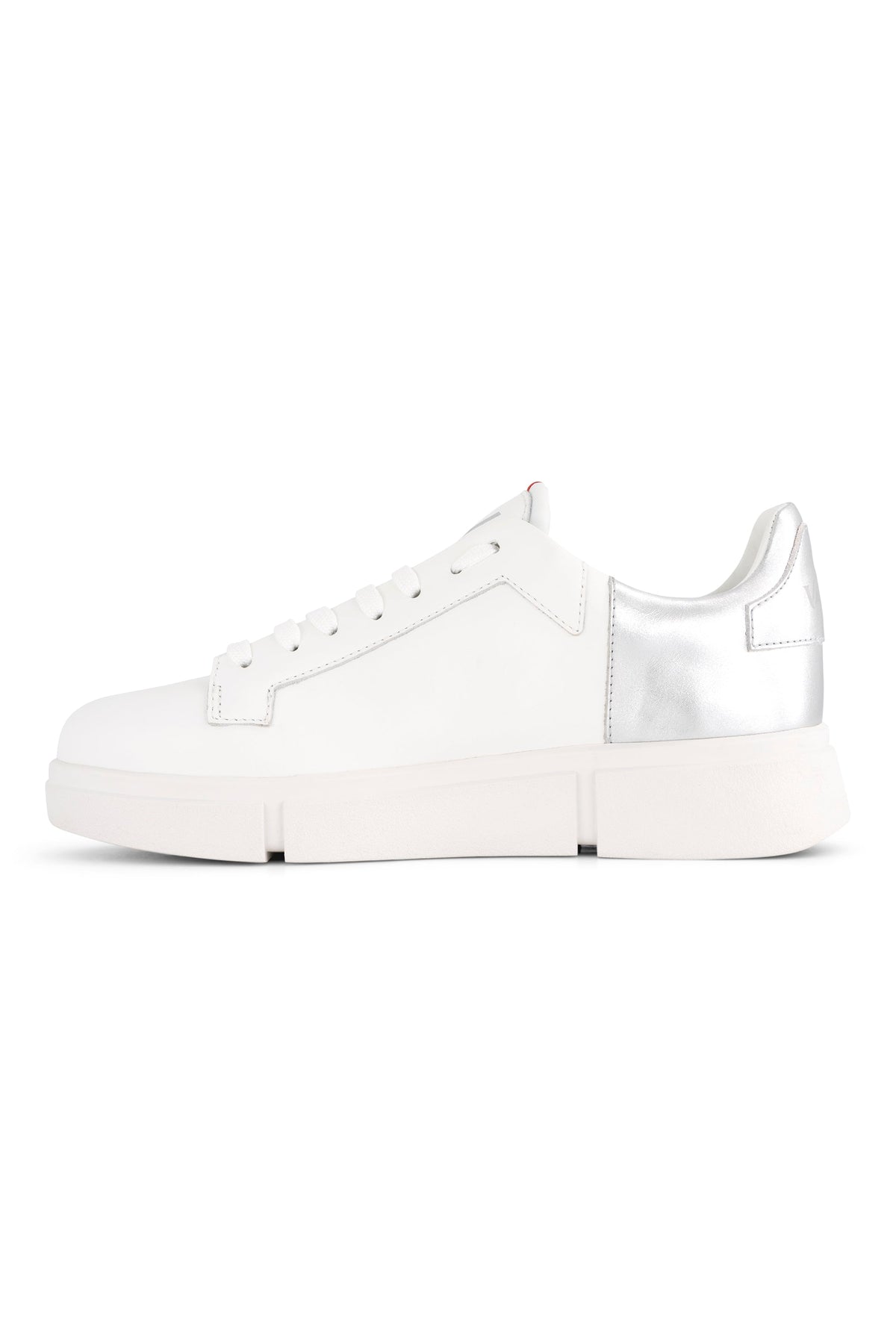 The Vassalli VS-001 White/Silver Laced Sneaker features a low-top design, thick platform sole, white laces, and a metallic silver heel accent, displayed in side profile on a plain white background.