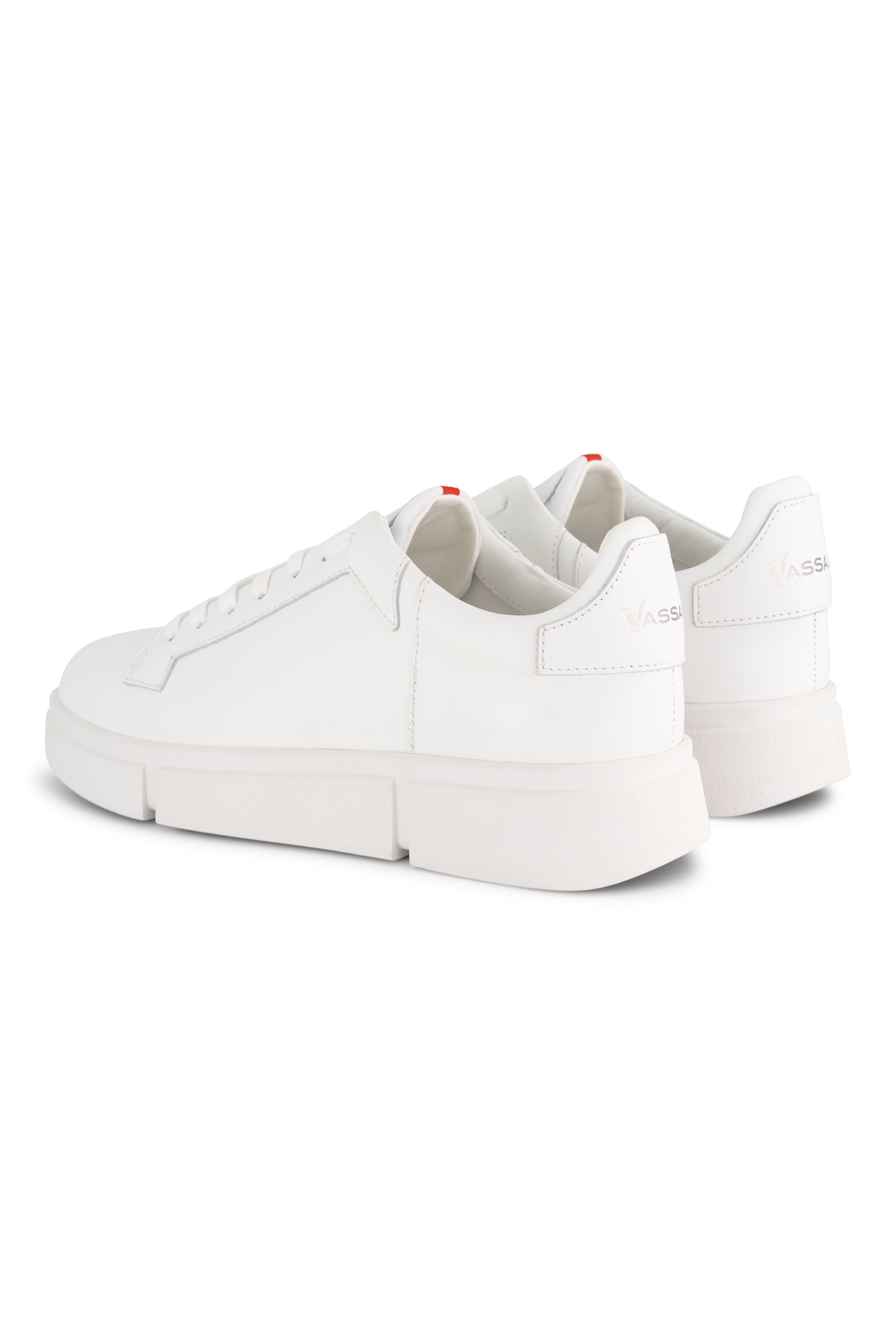 The Vassalli VS-001 White/White Laced Sneaker features a modern, minimal design with a white platform sole, matching laces, and subtle branding on the back heel.