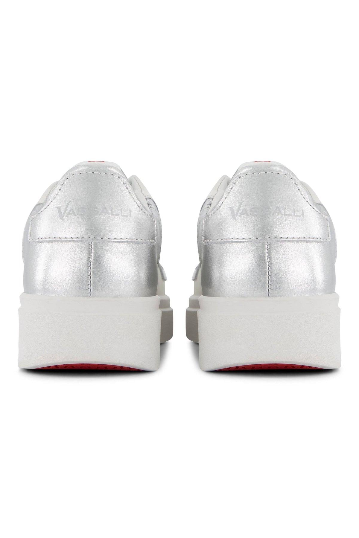 Back view of Vassalli VS-004 White/Silver laceless sneakers with metallic silver uppers, white platform soles, and the Vassalli brand name embossed on the heels.