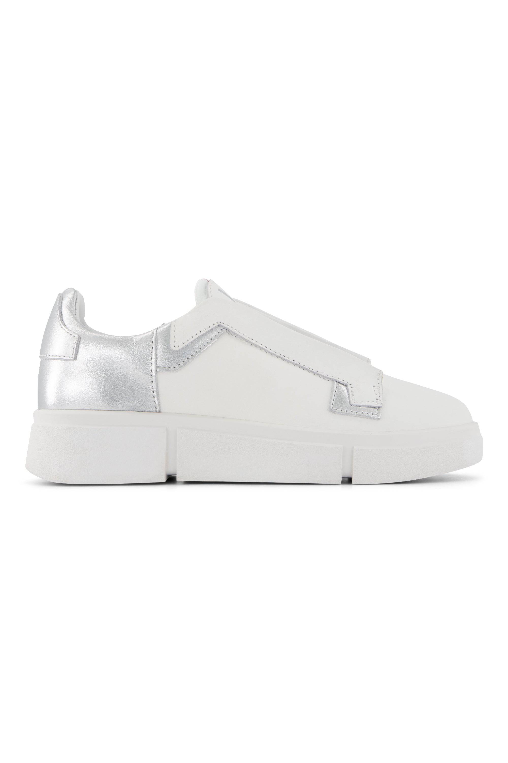 The Vassalli VS-004 White/Silver Laceless Sneaker features a chunky sole, metallic heel and side accents, and a modern minimalist smooth leather design—effortless style with no visible laces.