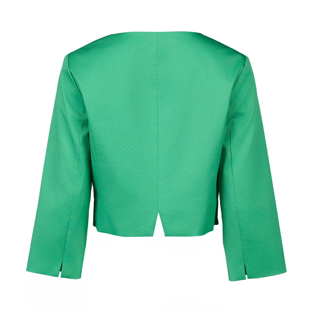 Back view of the Vassalli Cropped Jacket - Clover, a bright green, long-sleeved layer with clean lines, straight cut, and small center hem slit. Minimalistic design shown against a plain white background.