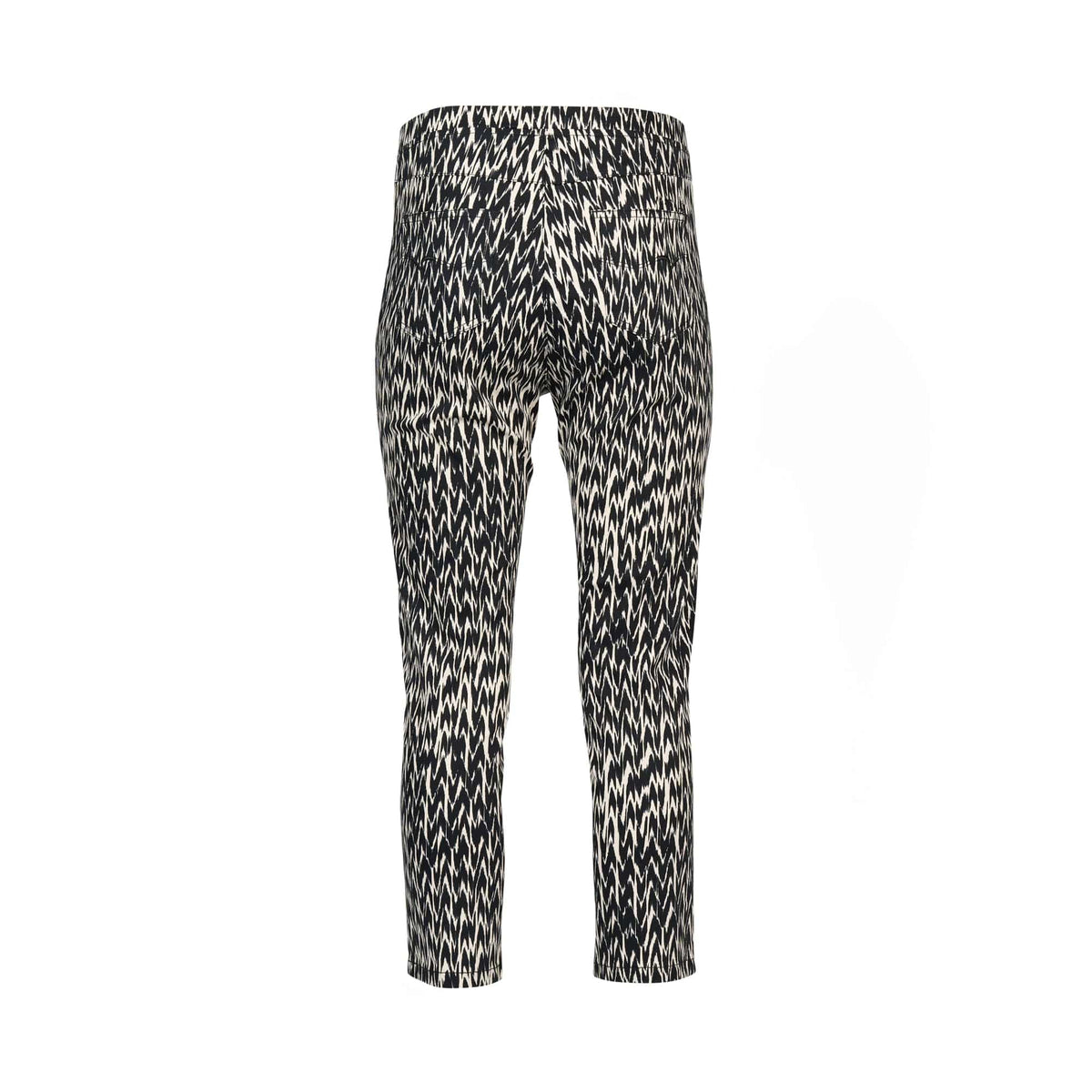 The Vassalli Harbour 7/8 Pant - Beau is a black and white patterned pull-on pant with a zigzag design, shown from the back. It features stretch fabric, a slim fit, and cropped length.