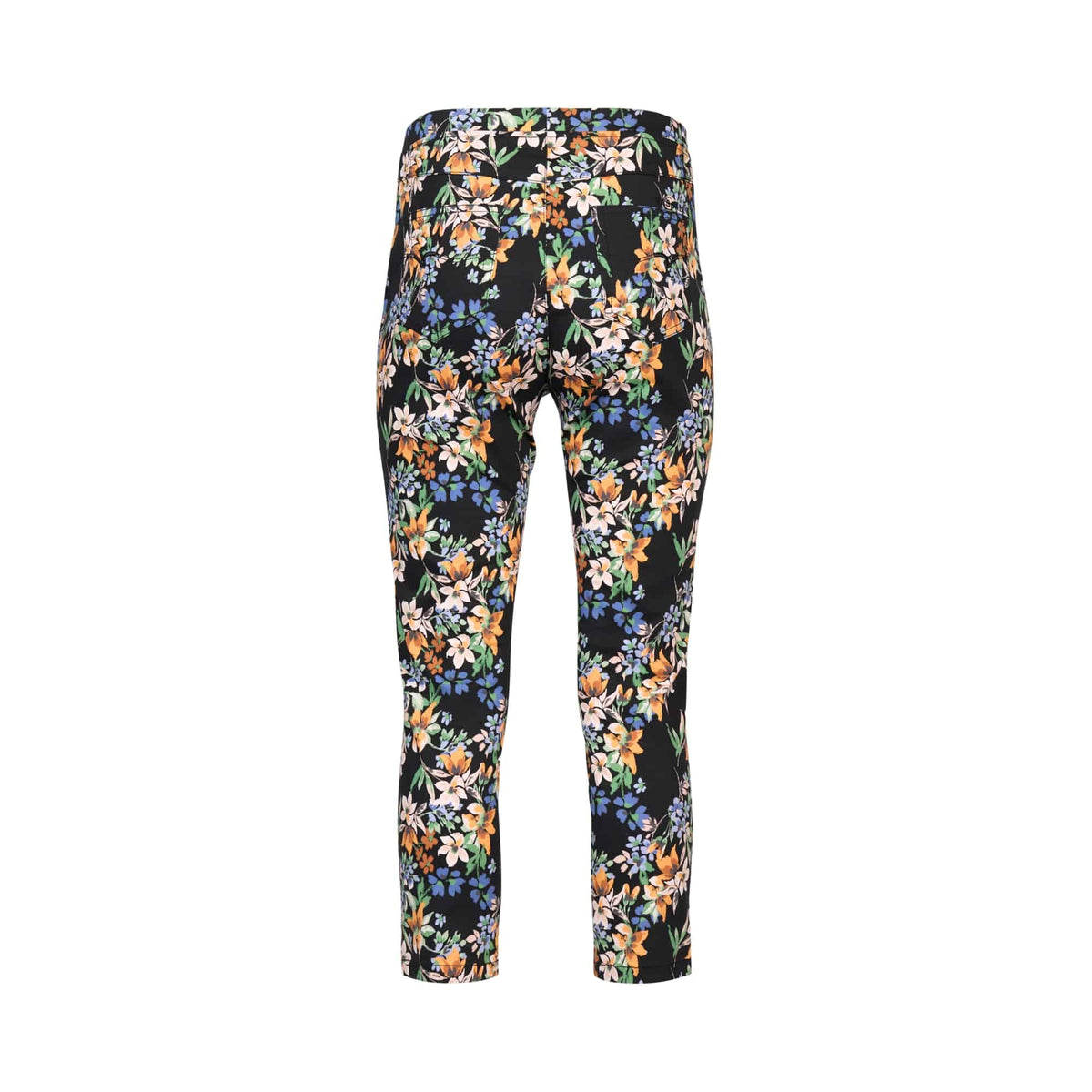The Vassalli Harbour 7/8 Pant - Grove is a black high-waisted, cropped skinny pant with an all-over colorful floral print in orange, yellow, blue, and green stretch fabric, shown from the back on a white background.