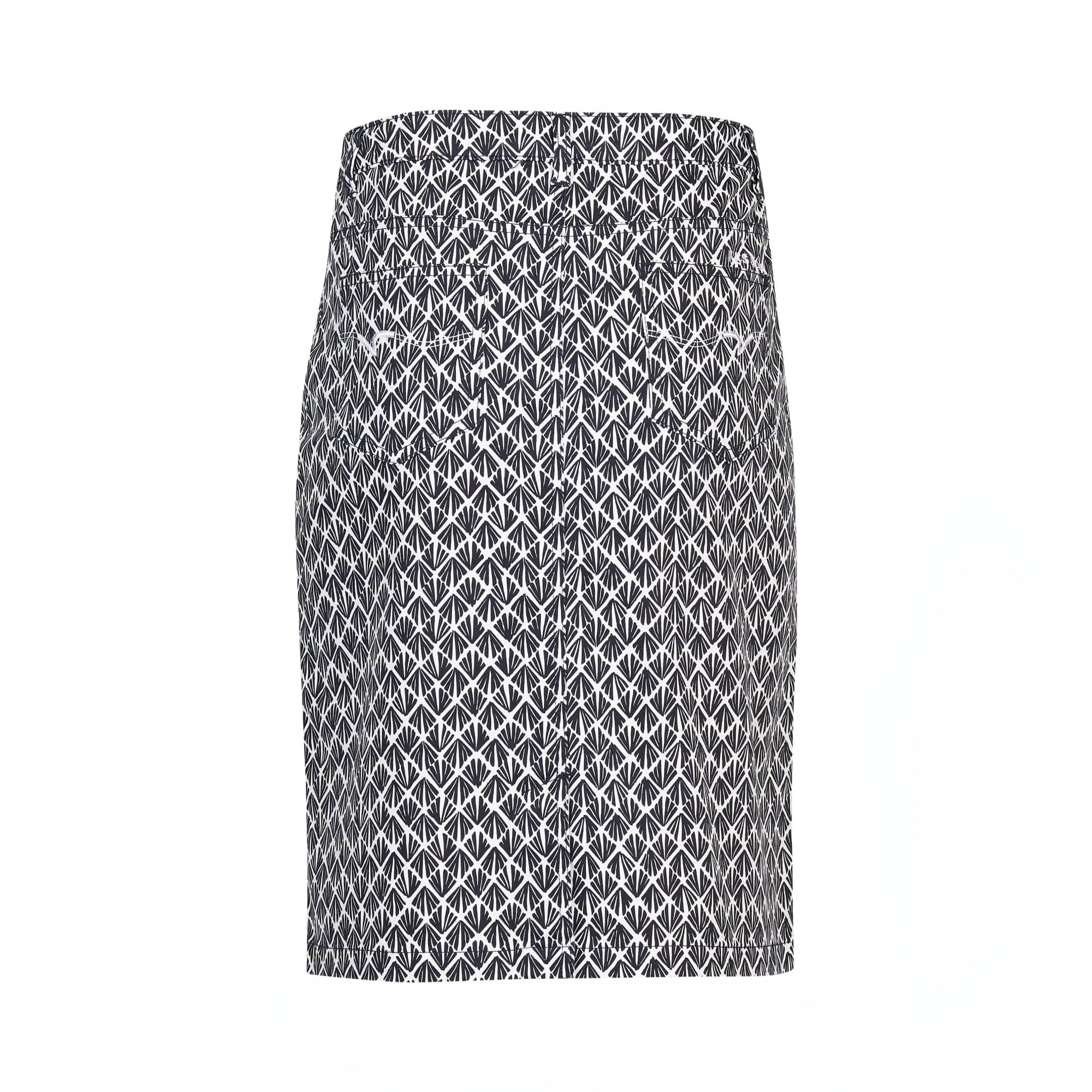 The Vassalli Poppy Lightweight Skirt - Fan is a stretch fabric skirt in black and white with a geometric repeating triangle pattern, shown on a plain white background.