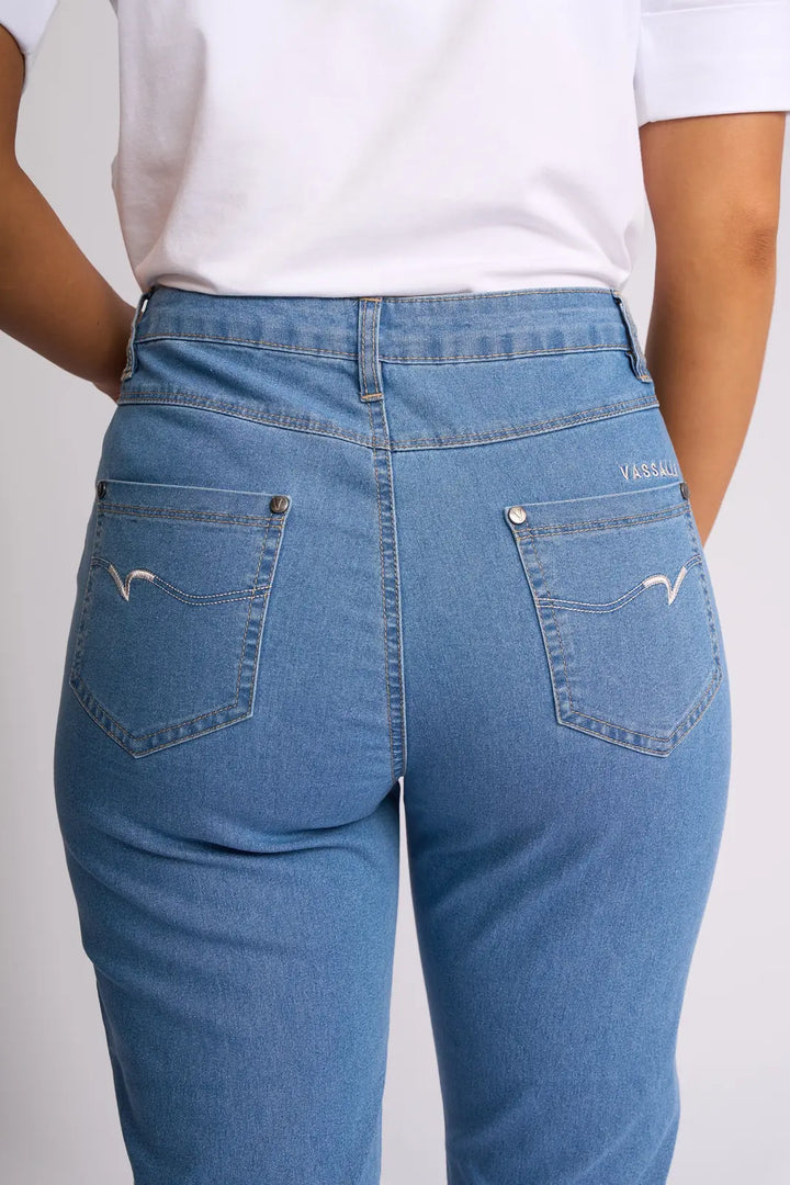 A person is shown from the back wearing the Vassalli Alfa Short - Light Denim (Contrast Stitch), highlighting the pockets and waistband of these lightweight stretch denim shorts, paired with a white t-shirt.