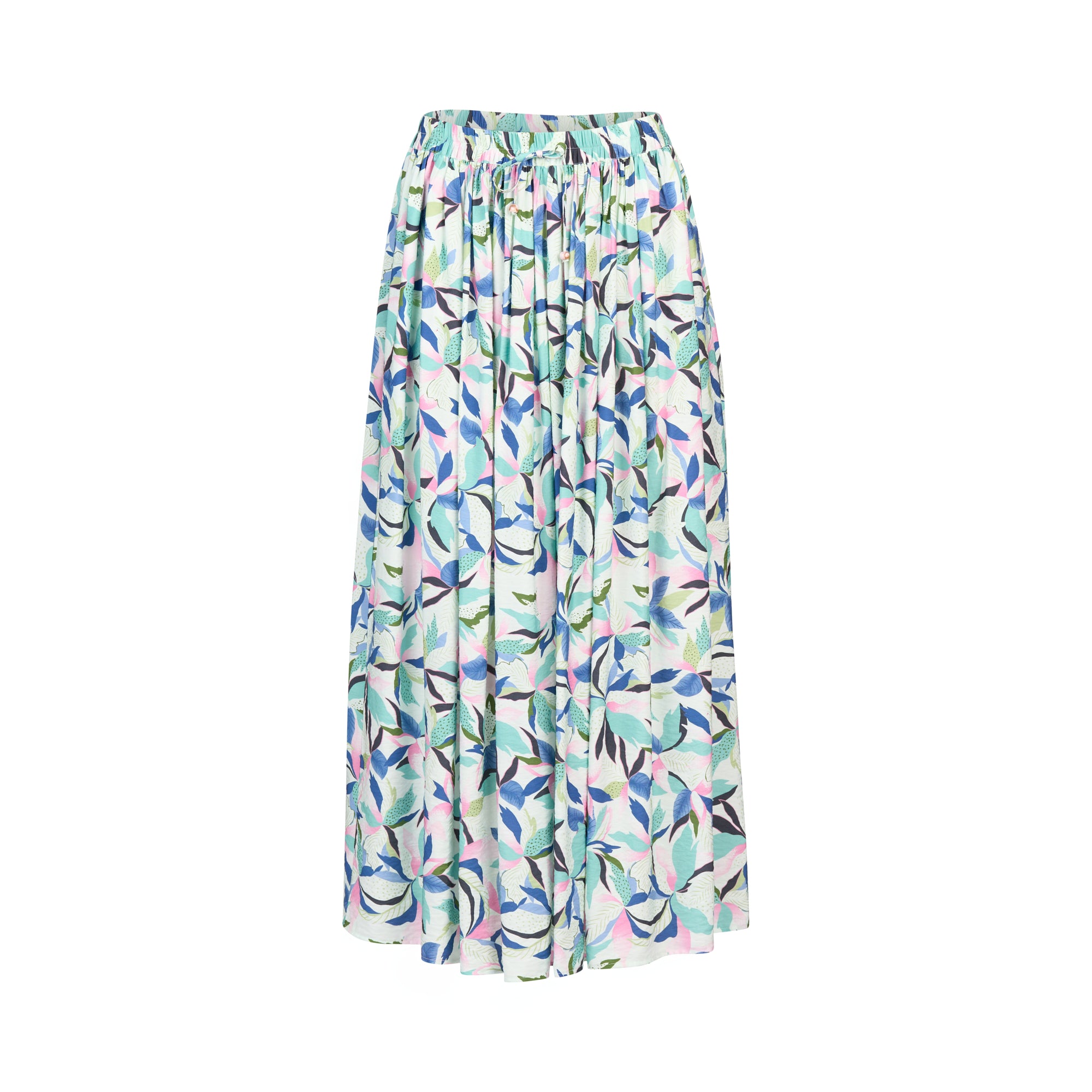 The Maxi Skirt - Soleil by Vassalli features a vibrant blue, green, lavender, and white leaf print, a gathered elastic waistband, and practical side seam pockets for style and convenience.